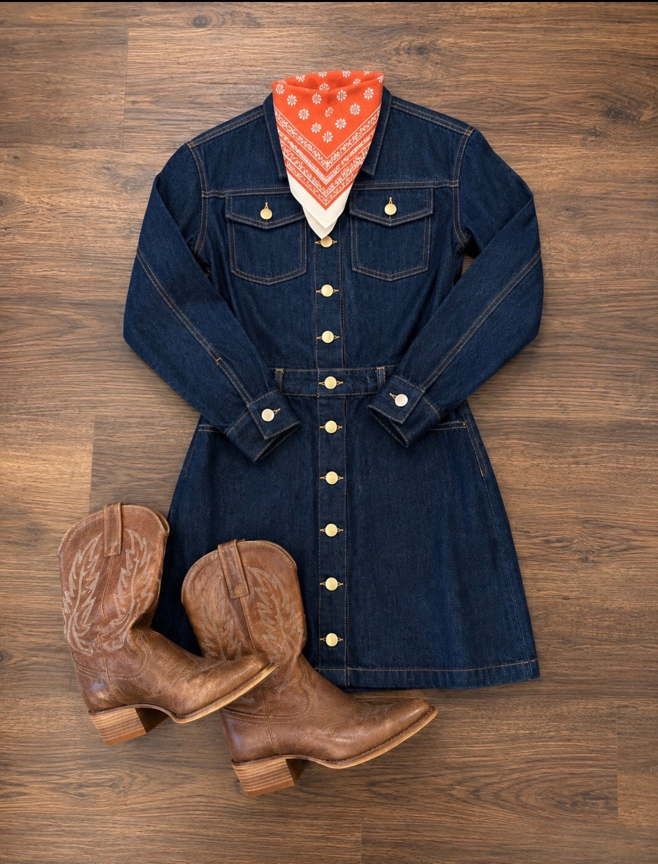Mini button front dress in a soft indigo did with functional buttons and a flattering waist fit wearing a size extra small.