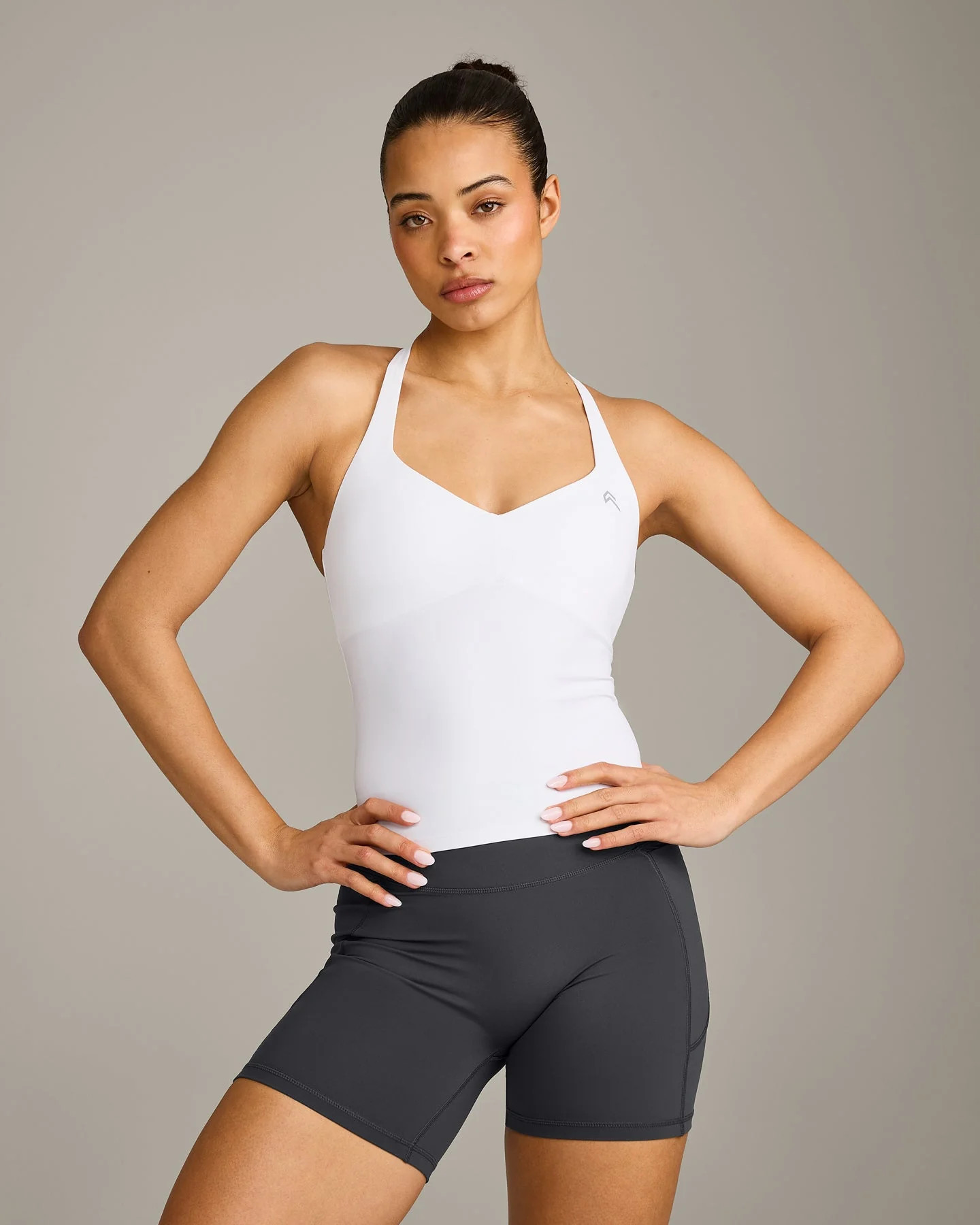 UnifiedMove\u2122 T Back Mid Tank Top with Built in Bra Shelf with Reflective Logo 
 White | Oner Active (UK / US)