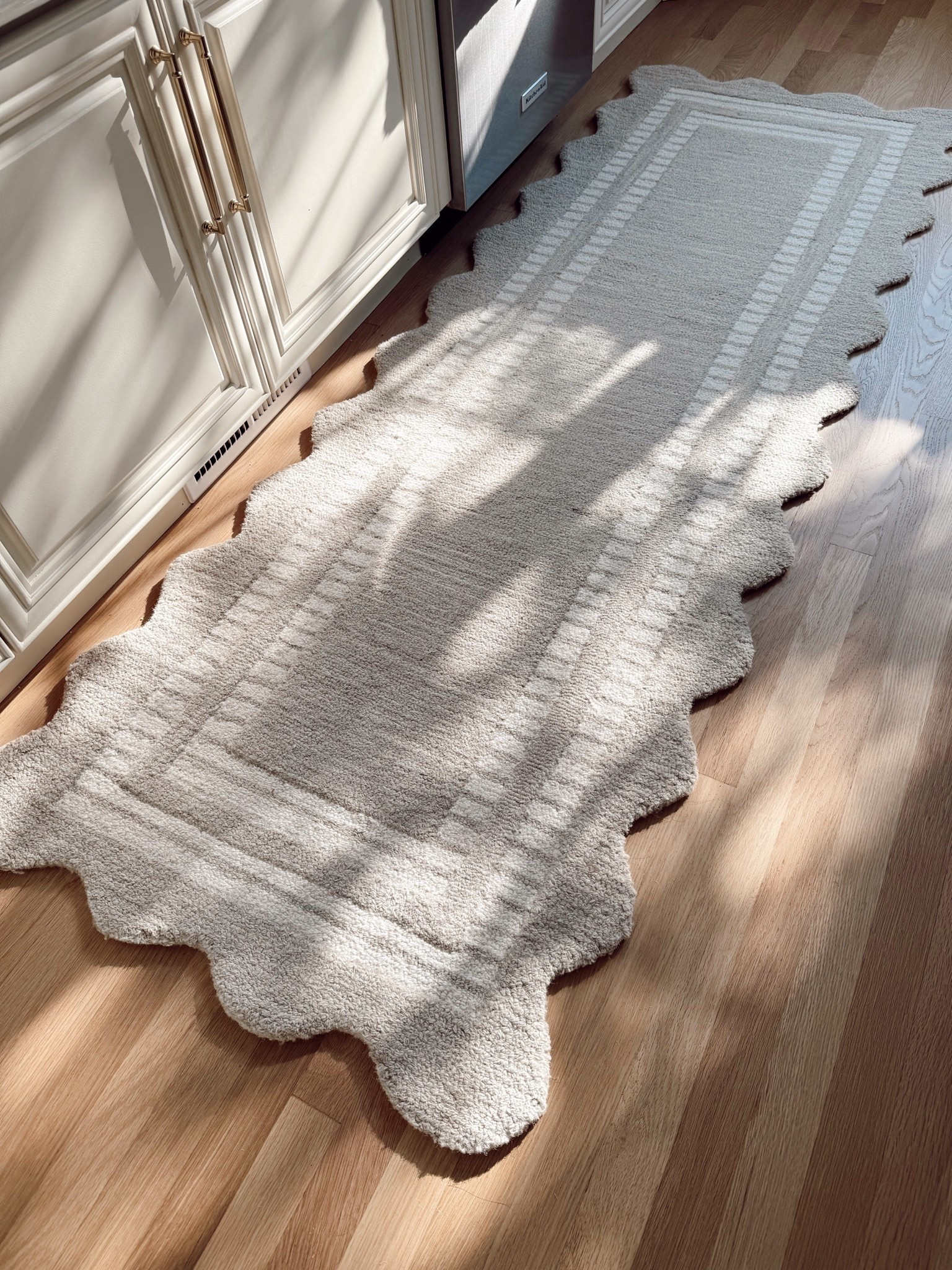 Love this scalloped wool runner in my kitchen!

#LTKHome