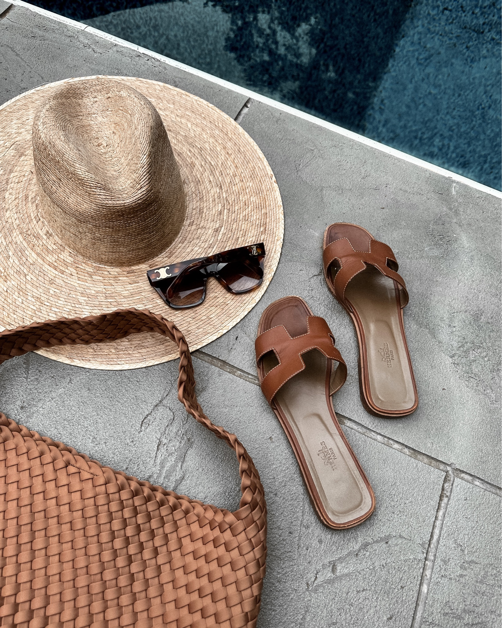 Poolside and beach essentials. Linked similar Hermes sandals. #beach #pool #sandals #beachhat #strawhat #celine #fashionjackson 

#LTKunder100 #LTKunder50 #LTKswim