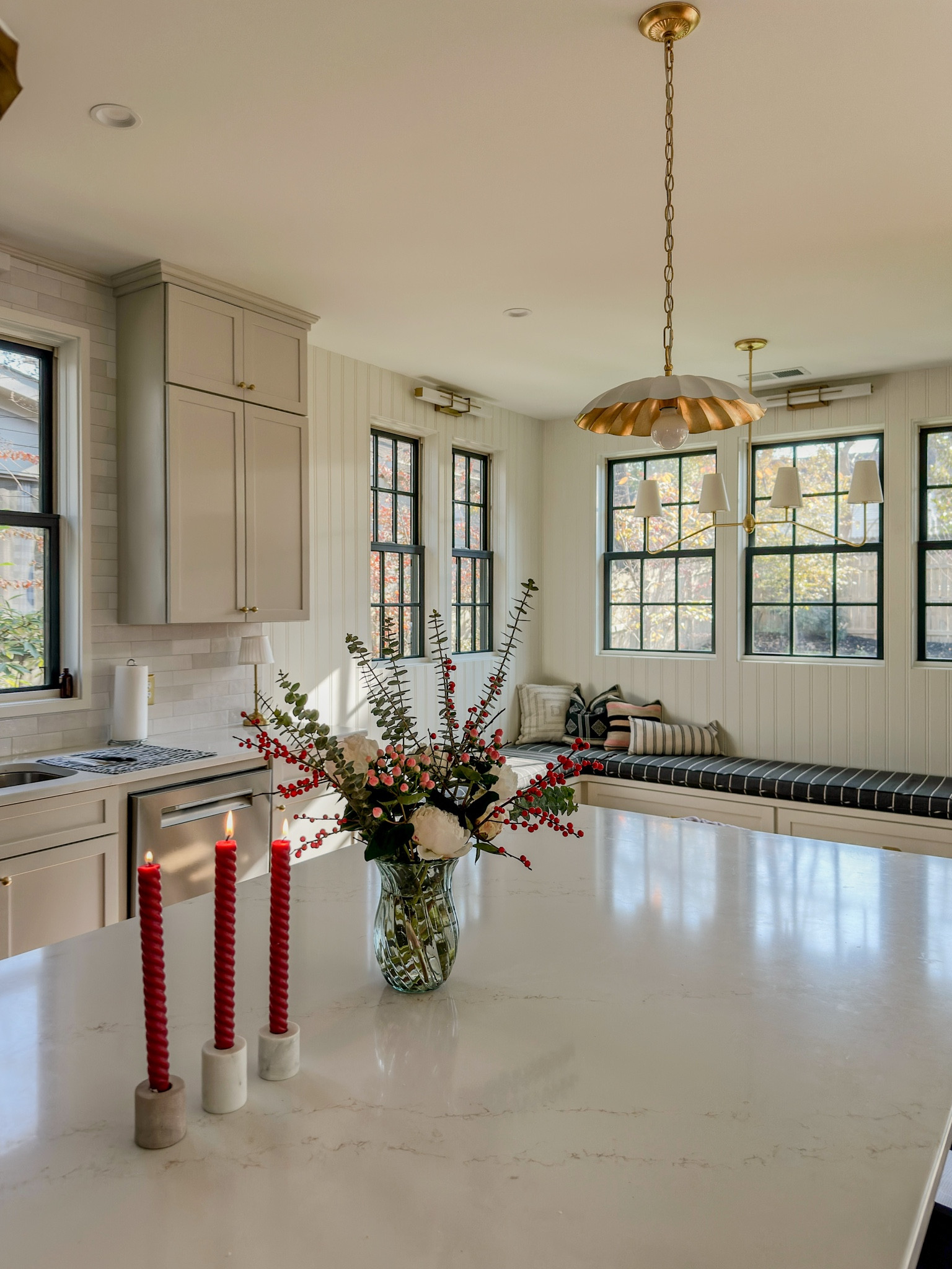 Holiday view of my client’s beautiful new kitchen addition. Vintage-inspired East Nashville home addition with a view of the built-in banquette ✨ #rejuvenation #etsyfinds #lightology

#LTKHome #LTKHoliday #LTKCyberWeek