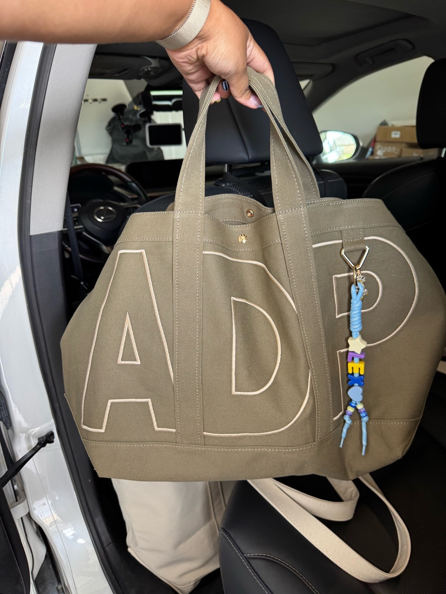 Bauble bar initial bag 
Solid Custom Alpha Tote - Mushroom Taupe - Desert Tan / Large

#LTKmomlife