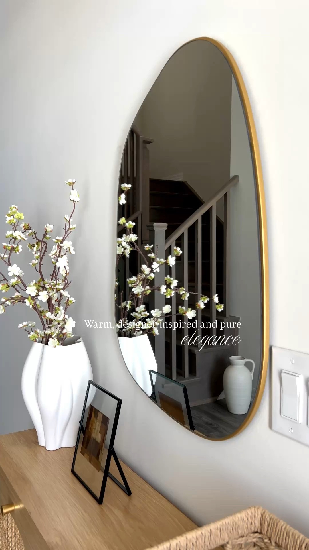 Designer inspired statement piece ~ everyone asks about ✨

It reflects the light so beautifully, makes the entryway feel bigger, and adds the perfect warmth to the space. 

#entryway #entrywaydecor #designerinspired #modernorganic

#LTKhome #LTKstyletip
