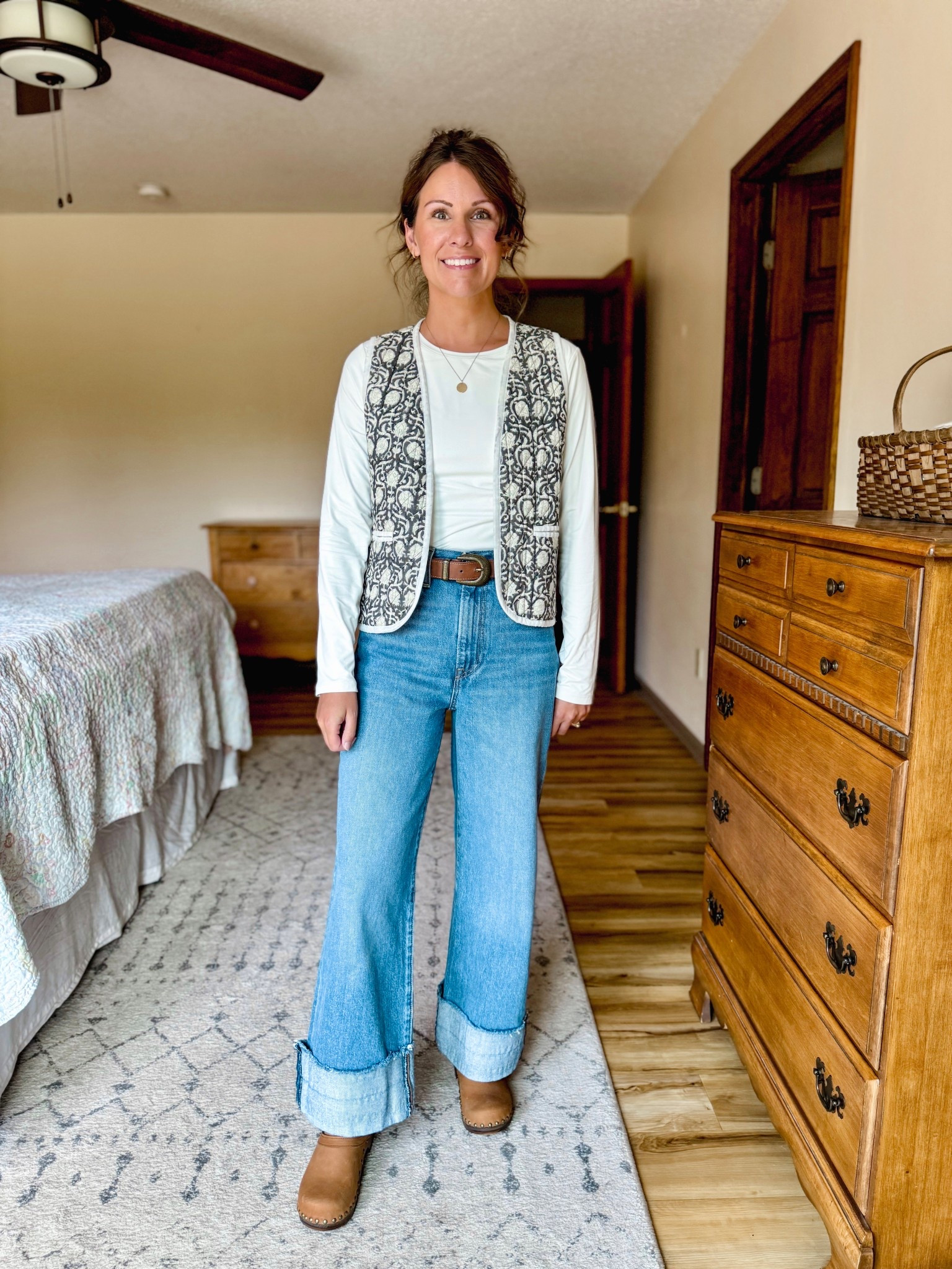 Weston did medium in my white long sleeve (I like to size up in these stretchy shirts), medium in my vest (small would work too), 25 in my Levi jeans (I cuffed them myself and linked some similar pairs). My clogs fit true to size 

#LTKPetite #LTKSeasonal #LTKFindsUnder50