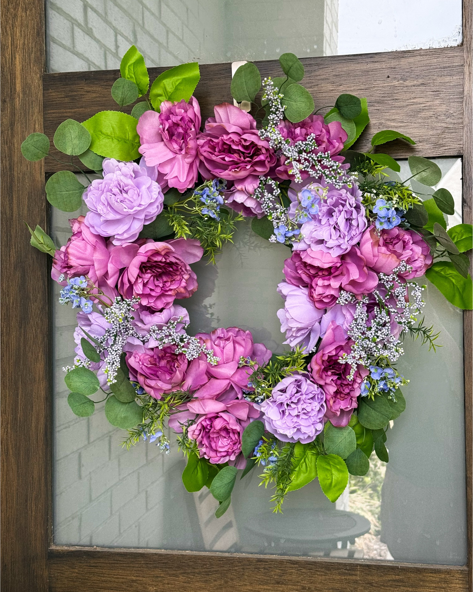 Love these purple wreaths 
Spring front porch 
Spring wreath 

#LTKHome #LTKSeasonal #LTKSaleAlert