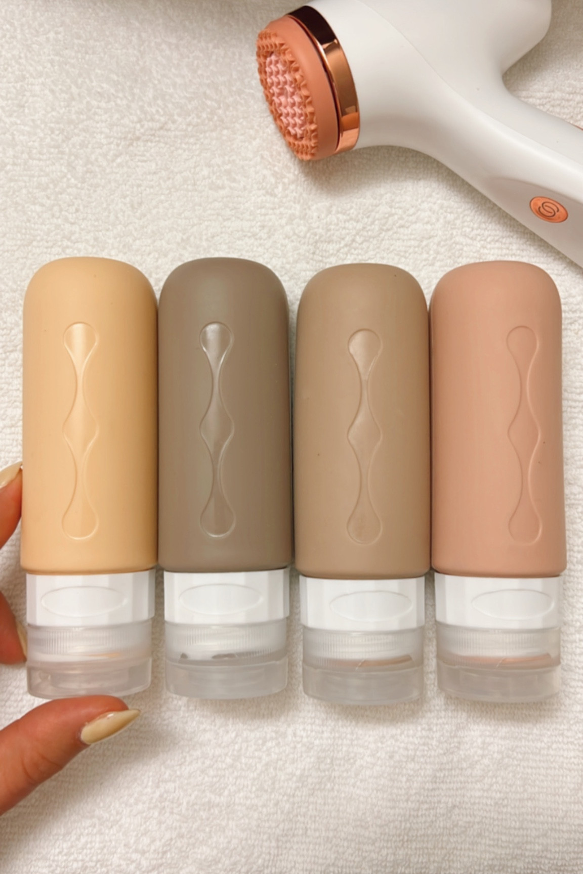 Neutral color silicone travel bottles TSA approved! Great stocking stuffer for a travel lover!

#LTKunder50 #LTKtravel #LTKGiftGuide