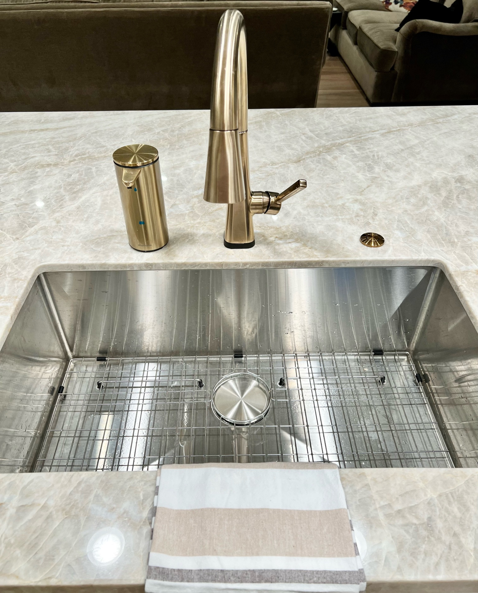 Kraus stainless sink. Delta champagne bronze faucet. Touchless faucet. Touchless simple human soap dispenser  

#LTKhome #LTKunder100 #LTKstyletip
