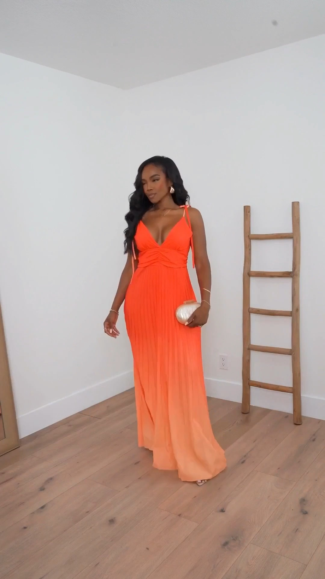 Scroll to shop this bright orange dress. It is perfect for your summer vacations. I love the cut on it. It is so flowy, probably also get away with wearing it to summer weddings!

#LTKWedding #LTKootd #LTKTravel