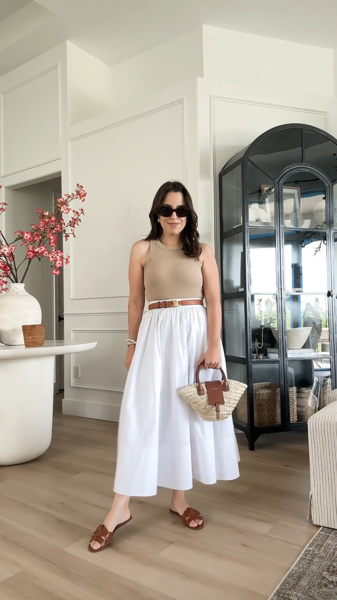 You really can't go wrong with a white midi skirt, ribbed tank, and tan accessories — it's that effortless neutral look I keep coming back to. These Celine sunglasses are my current obsession for pulling it all together!

classic style, timeless look, outfit inspo, old money style, petite fashion, vacation outfit, clean girl aesthetic, summer outfit

#LTKootd #LTKPetite #LTKU