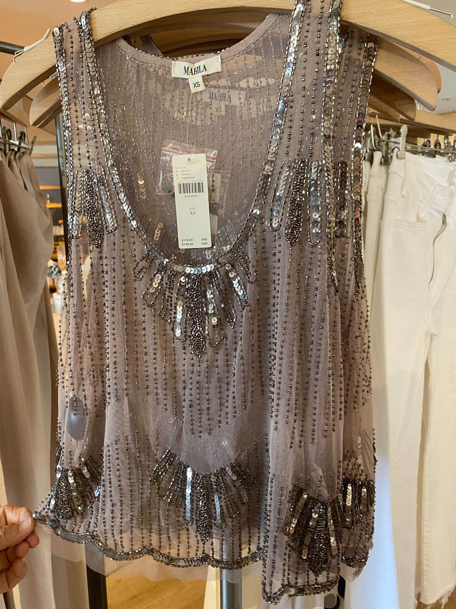 This beaded cami top is so cute! Wear a sexy white cami bra underneath or a cute bra and pair with a silk skirt or jeans!

Anthropologie top, mesh top, see through top, see through tank, silver tank, beaded top

#LTKFind #LTKxAnthro #LTKxNSale