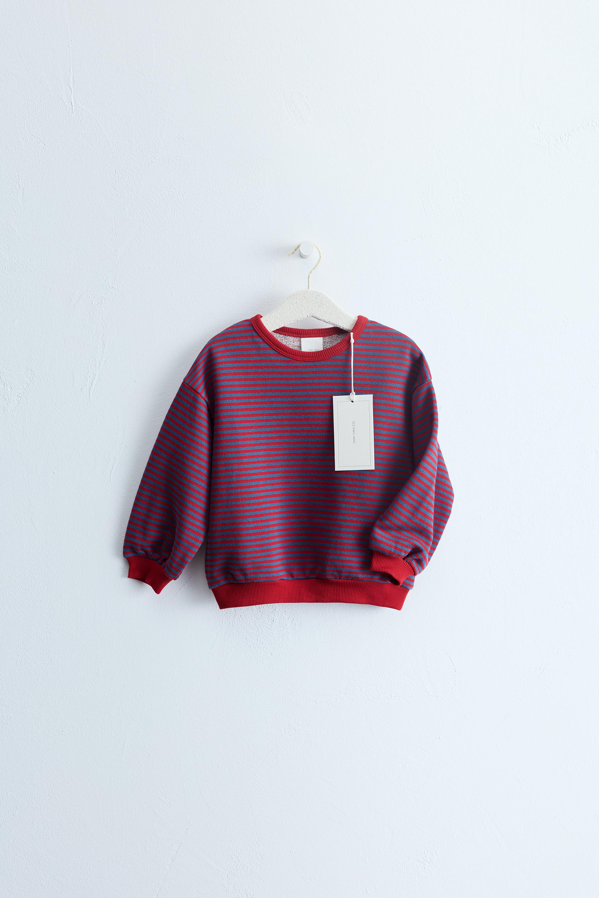 Sweatshirt made of cotton fabric. Features a ribbed round neck, cuffs, and hem. Detailed with con... | Zara US