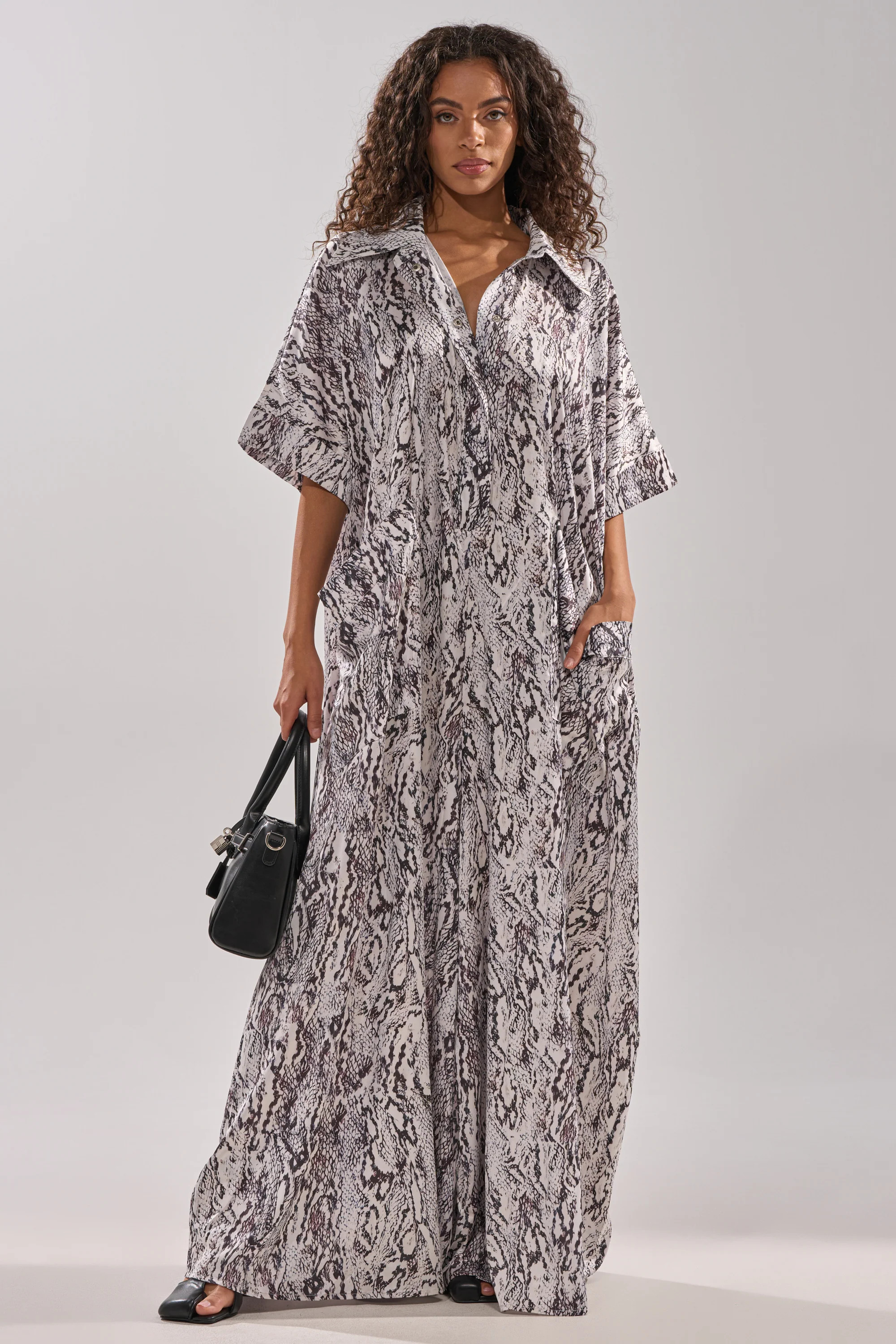 SHE'S RICH OVERSIZED SATIN JUMPSUIT IN SNAKE PRINT | AKIRA