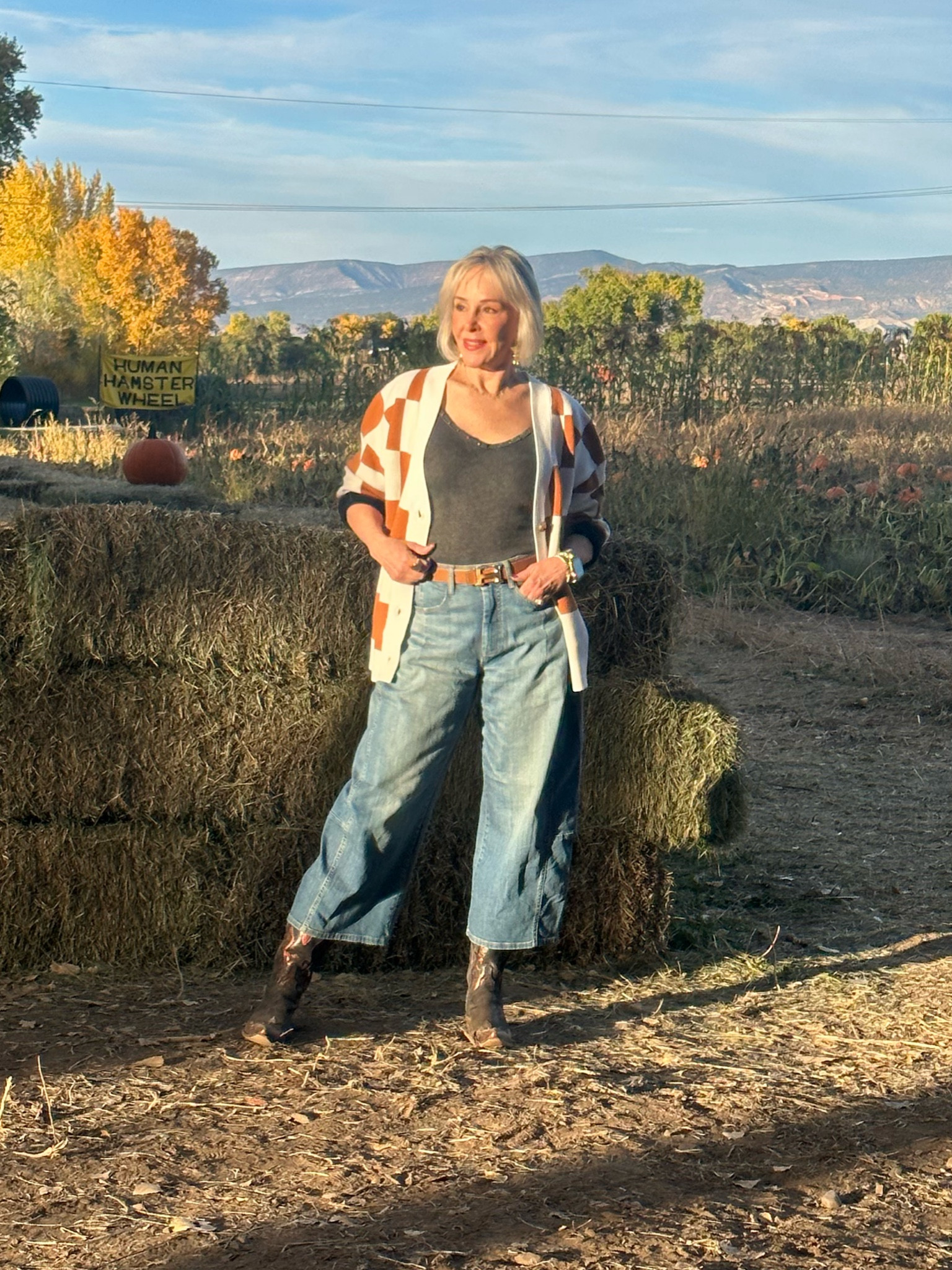 Call style wearing trending horseshoe jeans, cowboy boots and a larger burnt orange and off white cardigan sweater. If you are a Longhorn fan then this sweater should be in your closet. 


#LTKshoecrush #LTKover40 #LTKSeasonal