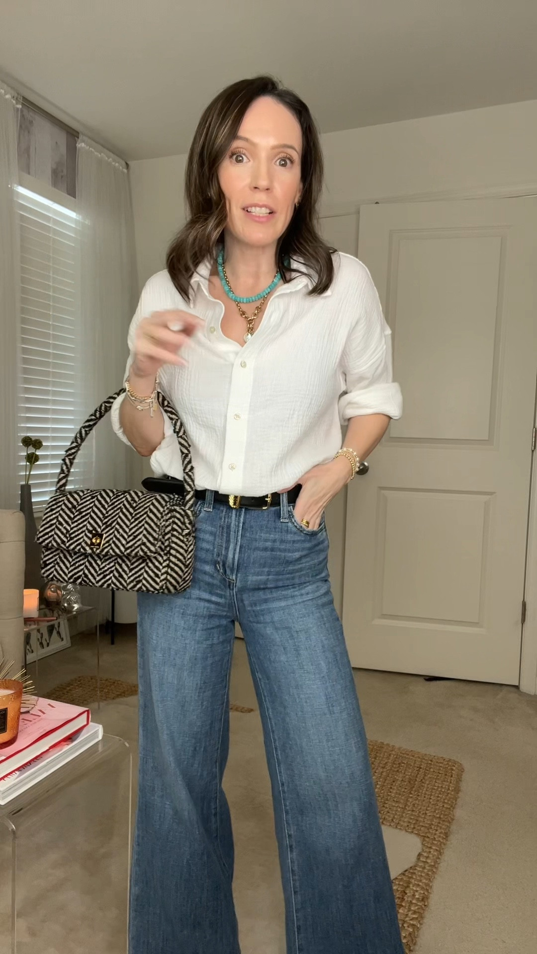 White blouse with wide leg cropped jeans 

#LTKOver40 #LTKSeasonal