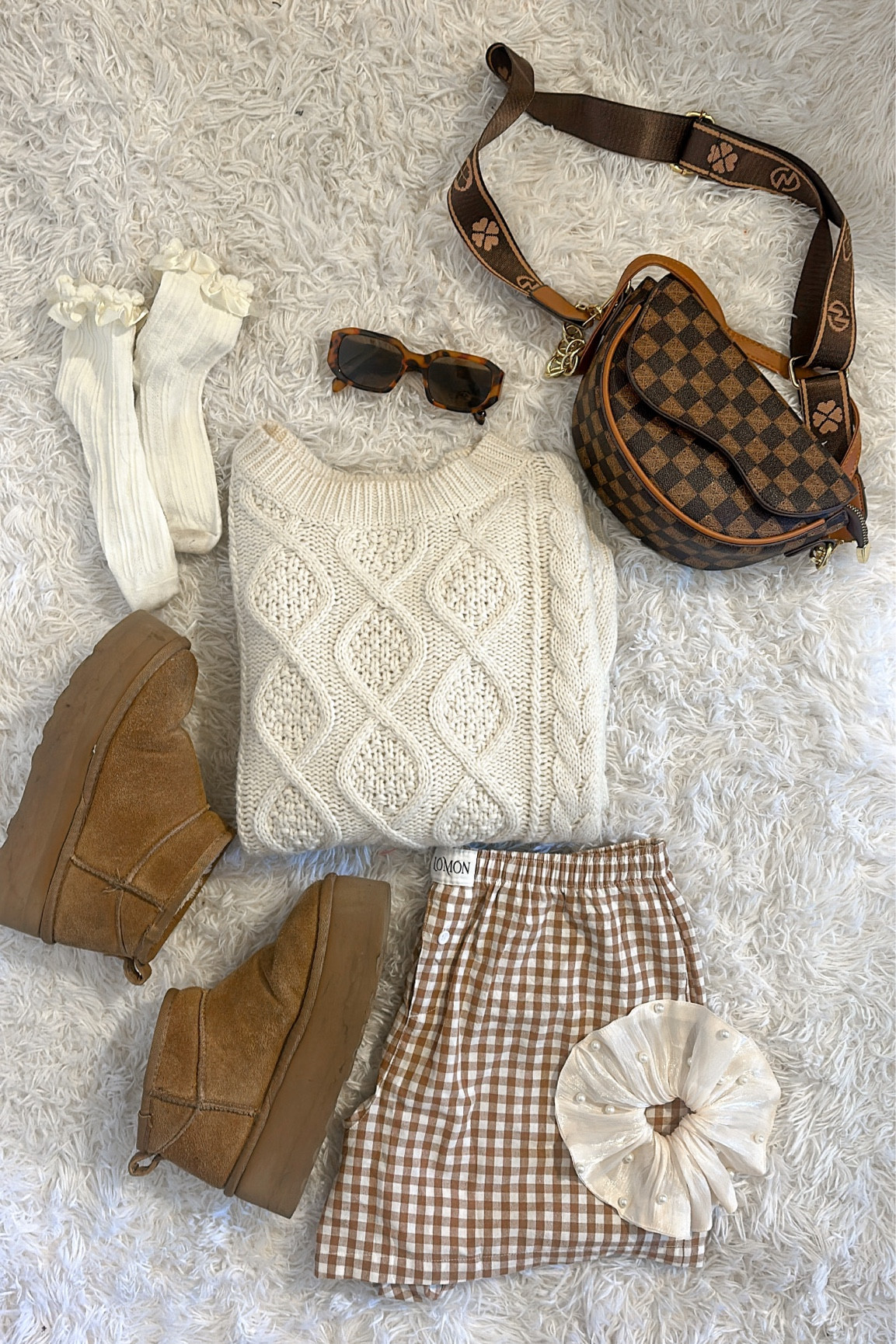 Pumpkin patch outfit for the perfect fall day out 🎃
- women’s white chunky knit sweater
- women’s brown checkered boxer shorts
- platform Ugg inspired boots 
- pearl oversize women’s hair scrunchie 
- frilly socks
- designer inspired lv cross body bag 

#LTKsalealert #LTKtravel #LTKSeasonal
