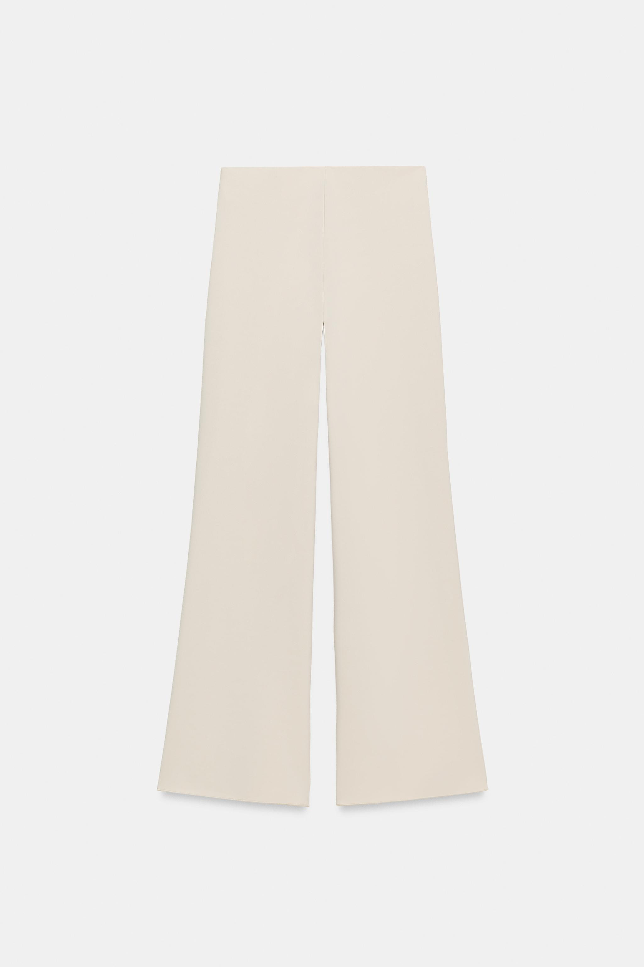 Pants made from stretch fabric. High-waisted with an elastic waistband. Wide leg. Flared hem. | Zara US