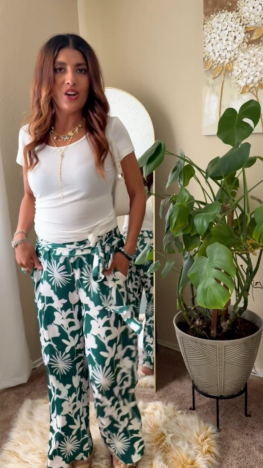 Statement pants are the moment 🌿✨ These wide leg pants are the perfect summer wardrobe piece to dress up with heels or keep casual with sneakers or sandals. Lightweight, comfy, flattering, and such an effortless chic vibe for brunch, vacation, errands, or date night. Paired with a simple white tee and accessories for that elevated everyday look 🤍 #LTKStyleTip
Top size S
Pants size S
Sandals size 8
Etsy: bracelets 10% off code SALE10

wide leg pants, summer outfit, tropical print pants, statement pants, vacation outfit, resort wear, casual chic outfit, elevated basics, green floral pants, summer fashion, comfy chic style, effortless outfit, everyday style, brunch outfit, lightweight pants, neutral outfit ideas, trendy summer look, women’s fashion, flowy pants outfit, capsule wardrobe, dress up or down outfit, stylish vacation look, resort chic, casual elegant outfit, fashion inspo, ootd style, spring summer trends, white shoulder bag outfit, relaxed fit pants, chic everyday wear

#LTKfitnessgoals #LTKootd #LTKmomlife