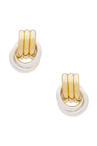 Heaven Mayhem Baby Knot Mixed Earrings in Gold & Silver from Revolve.com | Revolve Clothing (Global)