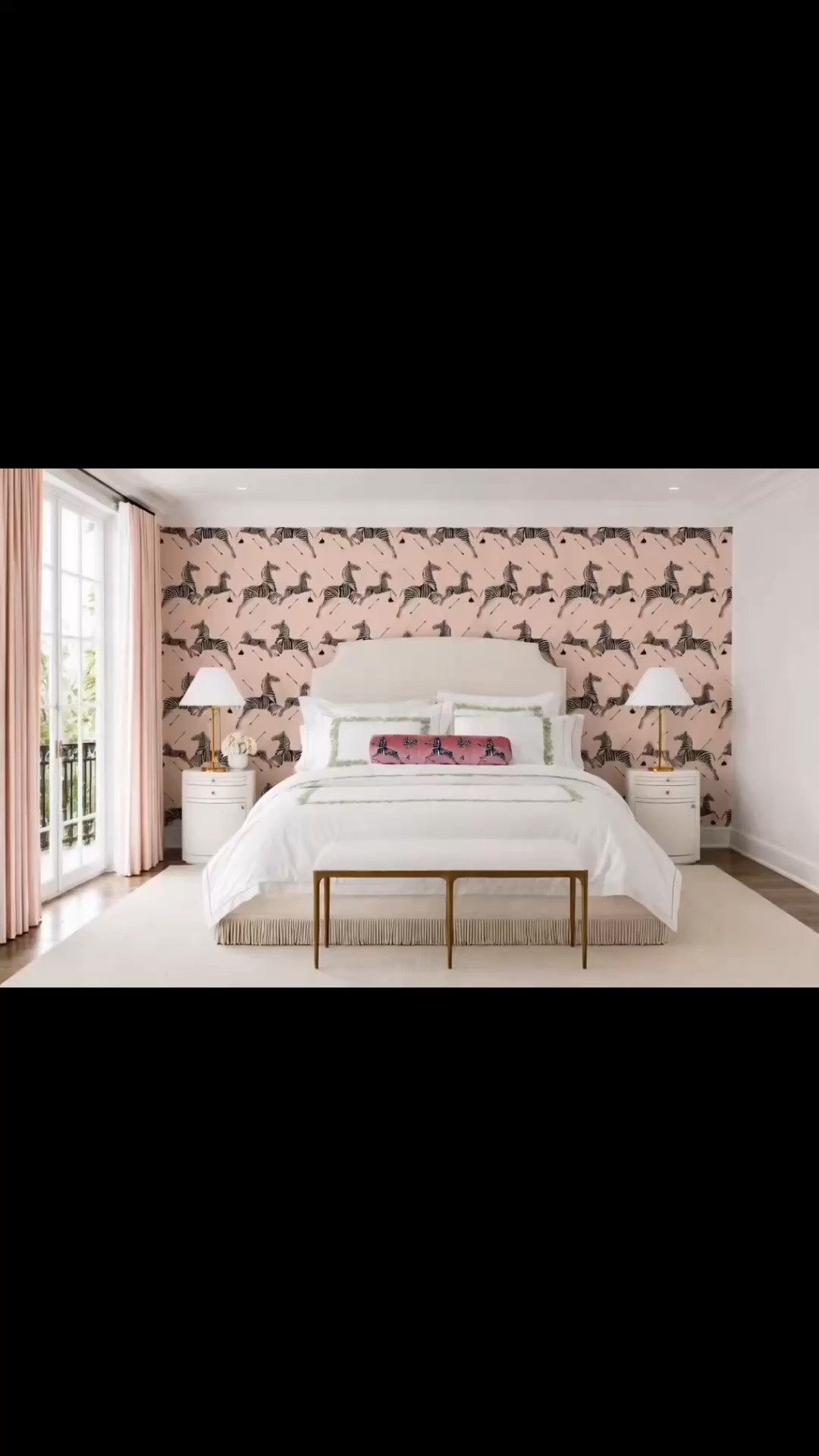 A romantic bedroom refresh filled with soft color, graceful curves, and timeless details. The pink Scalamandré zebra wallpaper creates a playful yet elegant backdrop, while this cream upholstered Serena & Lily bed—with its beautiful fringe detail—adds softness, texture, and a wonderfully romantic feel. Even better, the bed is currently included in Serena & Lily’s special pricing.

I paired it with Serena & Lily’s rounded Pinecrest nightstands. Their petite drum-shaped silhouette softens the room beautifully, while the discreet curved drawer and concealed cabinet storage keep bedside essentials organized without interrupting the clean, elegant look. The white finish and small brass hardware make them feel polished, cozy, and easy to style.

Elegant table lamps and an antique-gold brass bench add a refined finish at the foot of the bed. Layered with crisp bedding, a decorative lumbar pillow, blush curtains, a soft neutral rug, and a delicate floral arrangement, the entire bedroom feels feminine, collected, and quietly luxurious.

#SerenaAndLily #BedroomRefresh #BedroomDesign #Bed #UpholsteredBed #Bedding #LumbarPillow #Nightstand #RoundNightstand #PinecrestNightstand #HiddenStorage #TableLamp #Bench #BrassBench #Rug #Wallpaper #ZebraWallpaper #Curtain #FlowerArrangement #ModernClassic #RomanticBedroom #LTKHome

#LTKdayinmylife #LTKSaleAlert #LTKHome