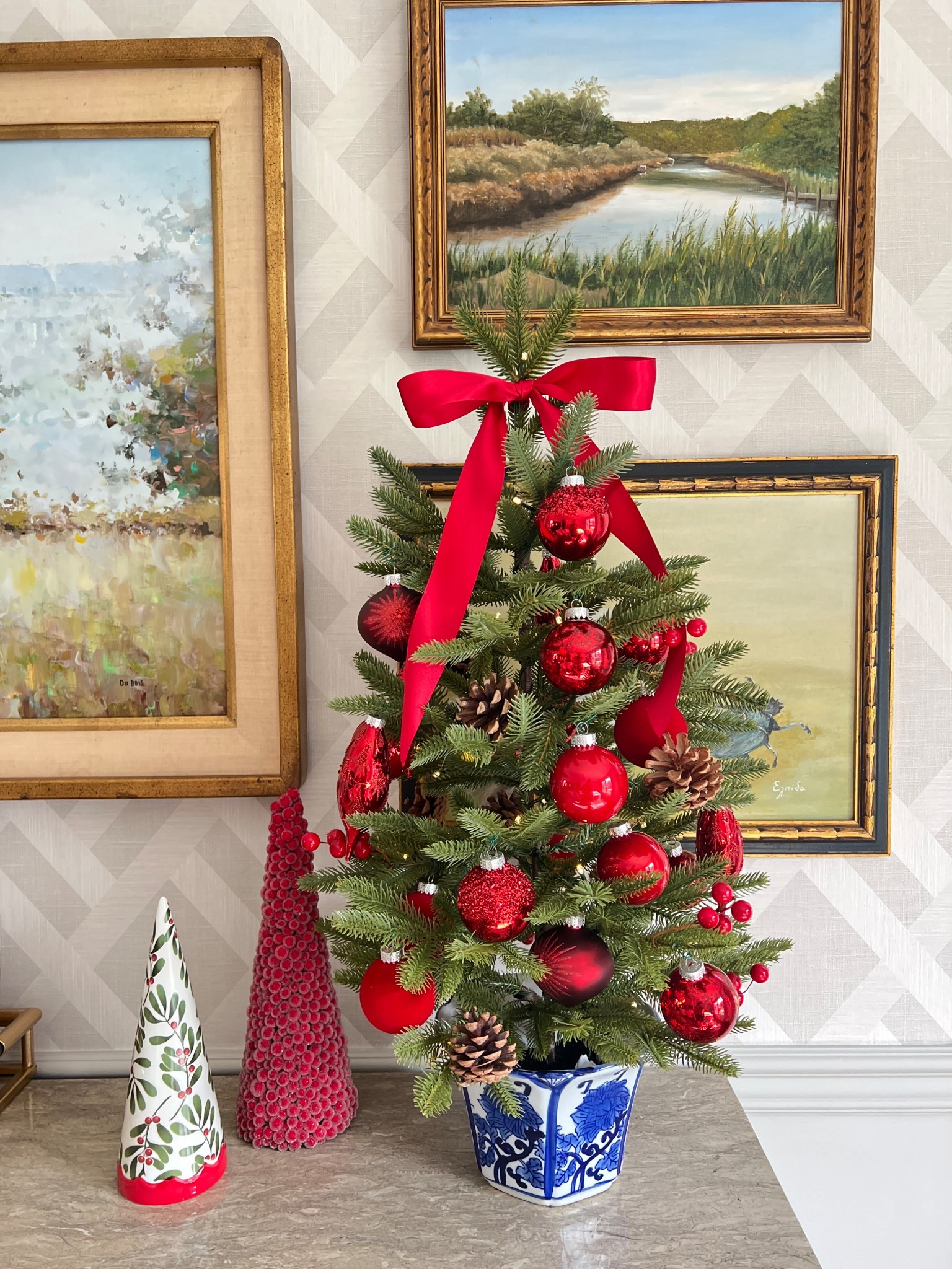 Holiday tree elevated with some ribbon, ornaments  and a chinoiserie pot.  

#LTKSeasonal #LTKActive #LTKHoliday