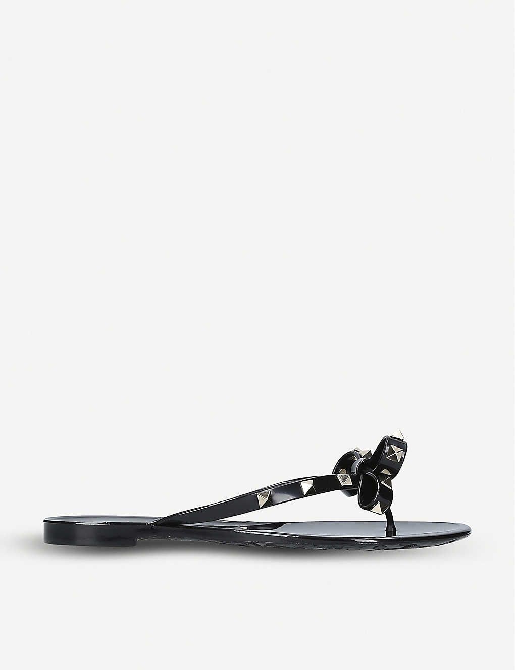 Rockstud-embellished rubber flip-flops | Selfridges