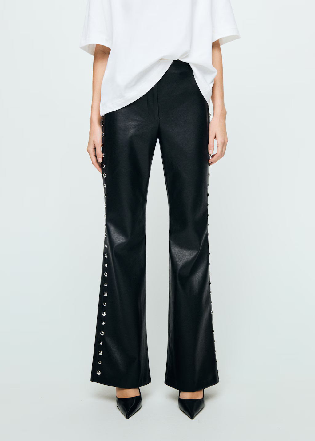 Studded leather-effect trousers - Women | MANGO United Kingdom | MANGO (UK)