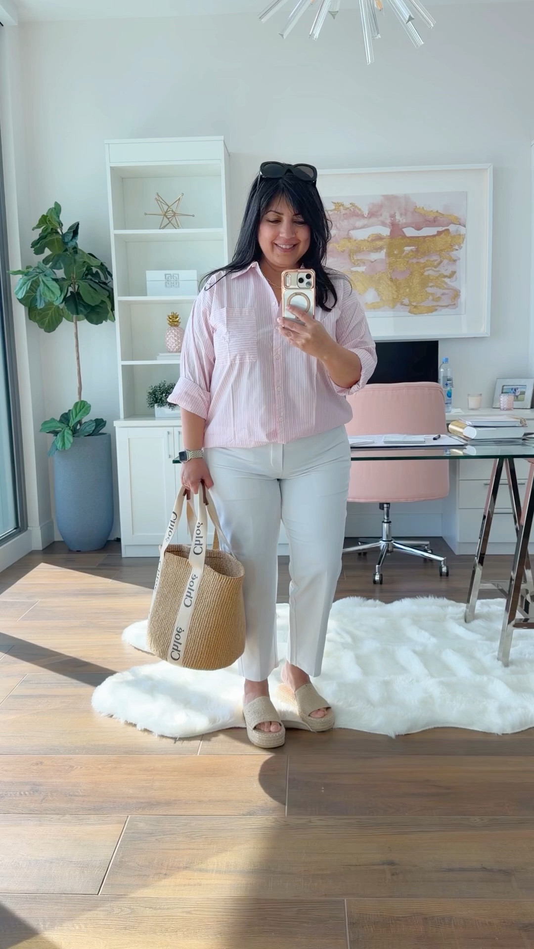LOFT Sale!!! 50% off + an extra 20% off  today + free shipping! Grab this cute pink shirt for only $24! Also, these white pants are on sale 20% off and are great for travel and everyday wear during the spring and summer! 

Loft pink striped shirt size large petite. Athleta white pants size 12 Petite also on sale. BEACH sandals. Chloe raffia tote bag. Prada sunglasses. 

Spring outfit, summer outfit, vacation outfit

#LTKOver40 #LTKMidsize #LTKSaleAlert