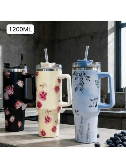 Esta caneca térmica de aço inoxidável com padrão floral possui uma alça, tampa e canudo, sen... | SHEIN