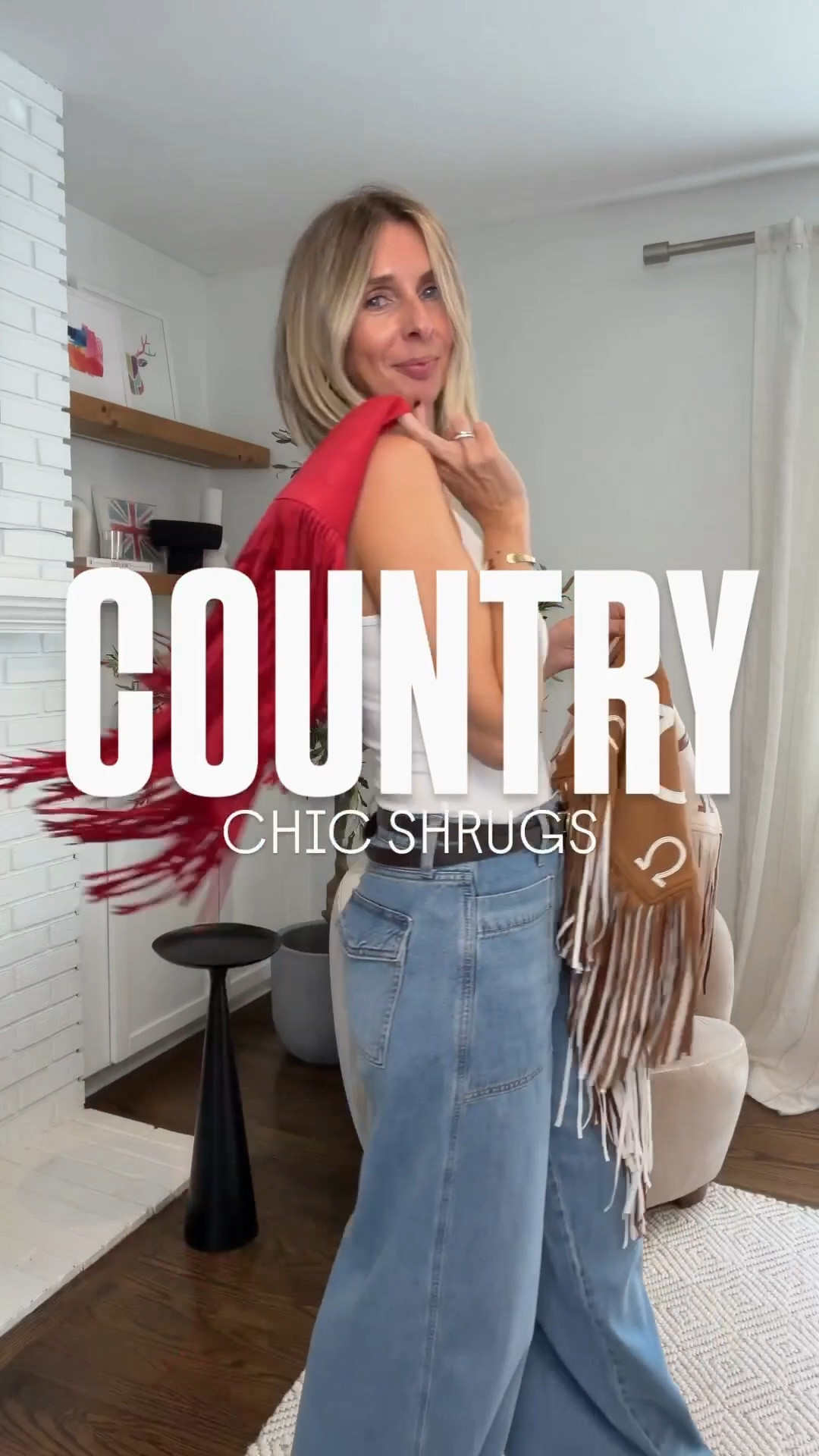 did i just find the most PERFECT piece to add a lil’ country to your look! the fringe. the fabric. the fit. all 10/10!!

fringe shrug - small in all 3
jeans - size 4
white shirt - small 
dark blue denim shirt - medium
light blue denim shirt - the denim shirt linked is NOT the one i’m wearing. it’s a similar option for you as mine is an older piece. 

now, i know you have a pair of jeans. i know you have a tank or a denim shirt/ jacket. all you need now is one of these INSANE shrugs and you’ve got yourself a CHIC western look. think country concert, fall event, or just to add a little flavor to girls night!

🐎🐎🐎🐎🐎🐎🐎🐎🐎🐎🐎🐎


country concert outfit. western outfit. western style. country style. shrug. fringe. fringe shrug. fall fashion 2026. effortless style, midlife style. over 40 style. fall style. cool style @thewillowtree

#LTKgrwm #LTKootd #LTKOver40