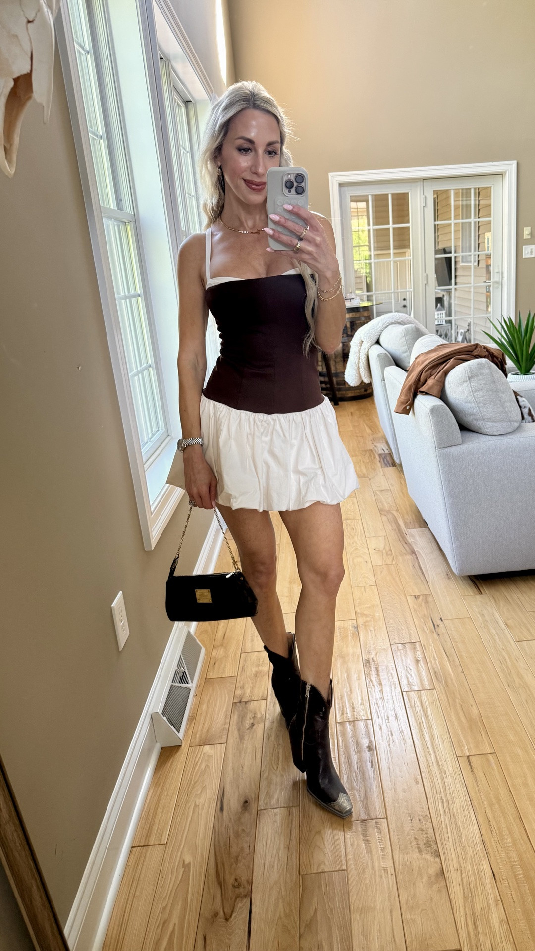 The girls' night out outfit 🤎✨

@Revolve romper + western boots = an easy favorite.

#LTKSeasonal #LTKOver40 #LTKPetite