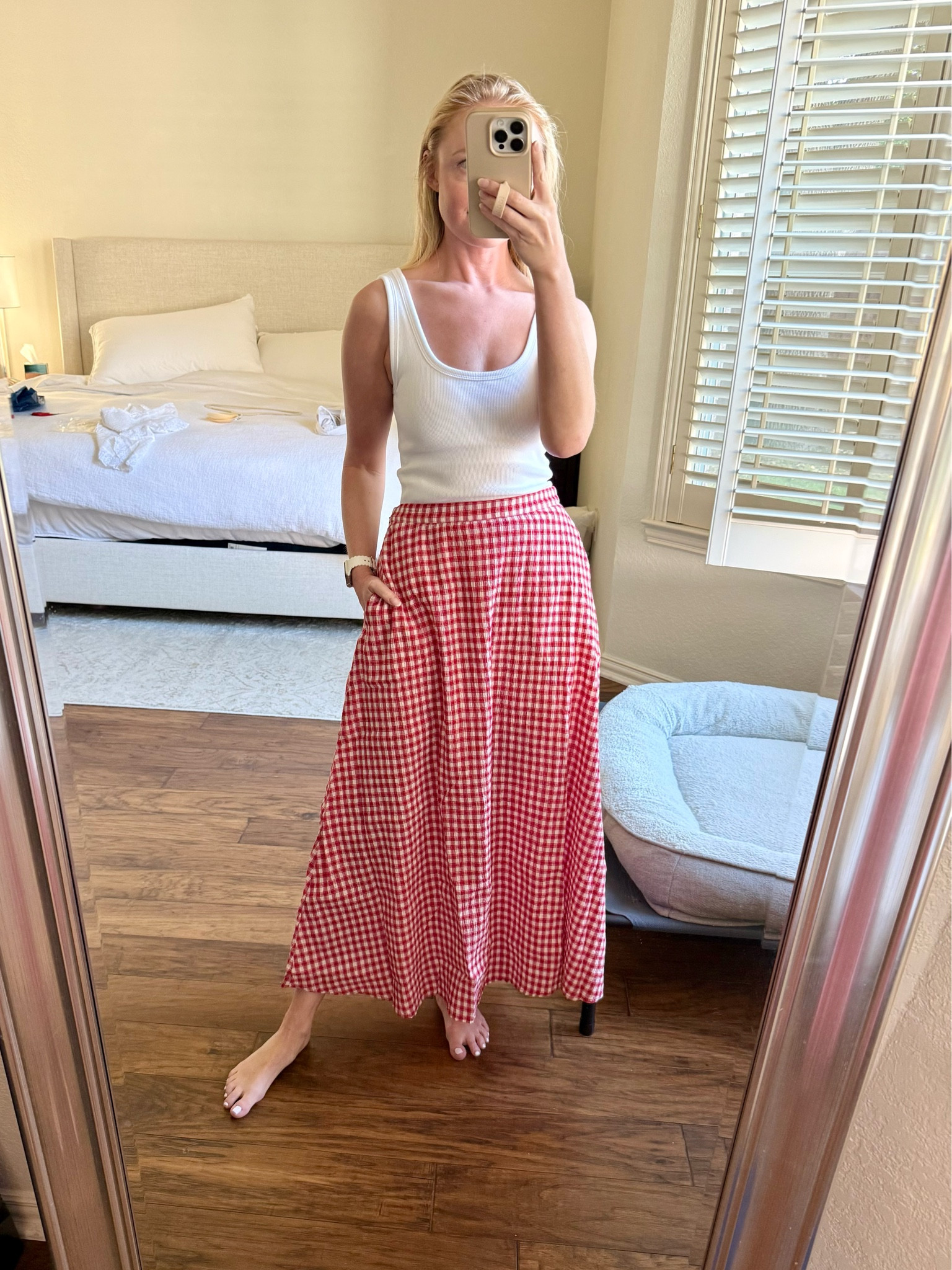 Love this gingham skirt! It would be so perfect for Memorial Day or Fourth of July! Wearing an XS in skirt and tank 

#LTKSeasonal #LTKPetite #LTKootd