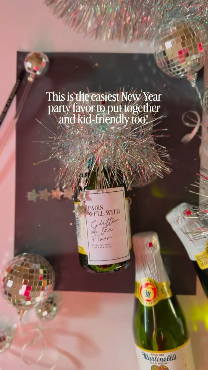 While you’re out Christmas shopping, you might as well grab extra tinsel ✨

This easy, kid-friendly New Year’s Eve drink takes two seconds to put together and makes the night feel special without adding one more thing to your plate. I have included the large tag to fit a standard bottle with the mini size tags too so you can do either/or.

No fancy ingredients.
No complicated setup.
Just a fun little moment for the kids and your guests too!

Save this for later — New Year’s Eve with kids sneaks up fast… and so no one can say I shared this too late 😅🎉. And for the Swifties…this is me trying…to help you plan ahead. Say GLITTER for the easy details!