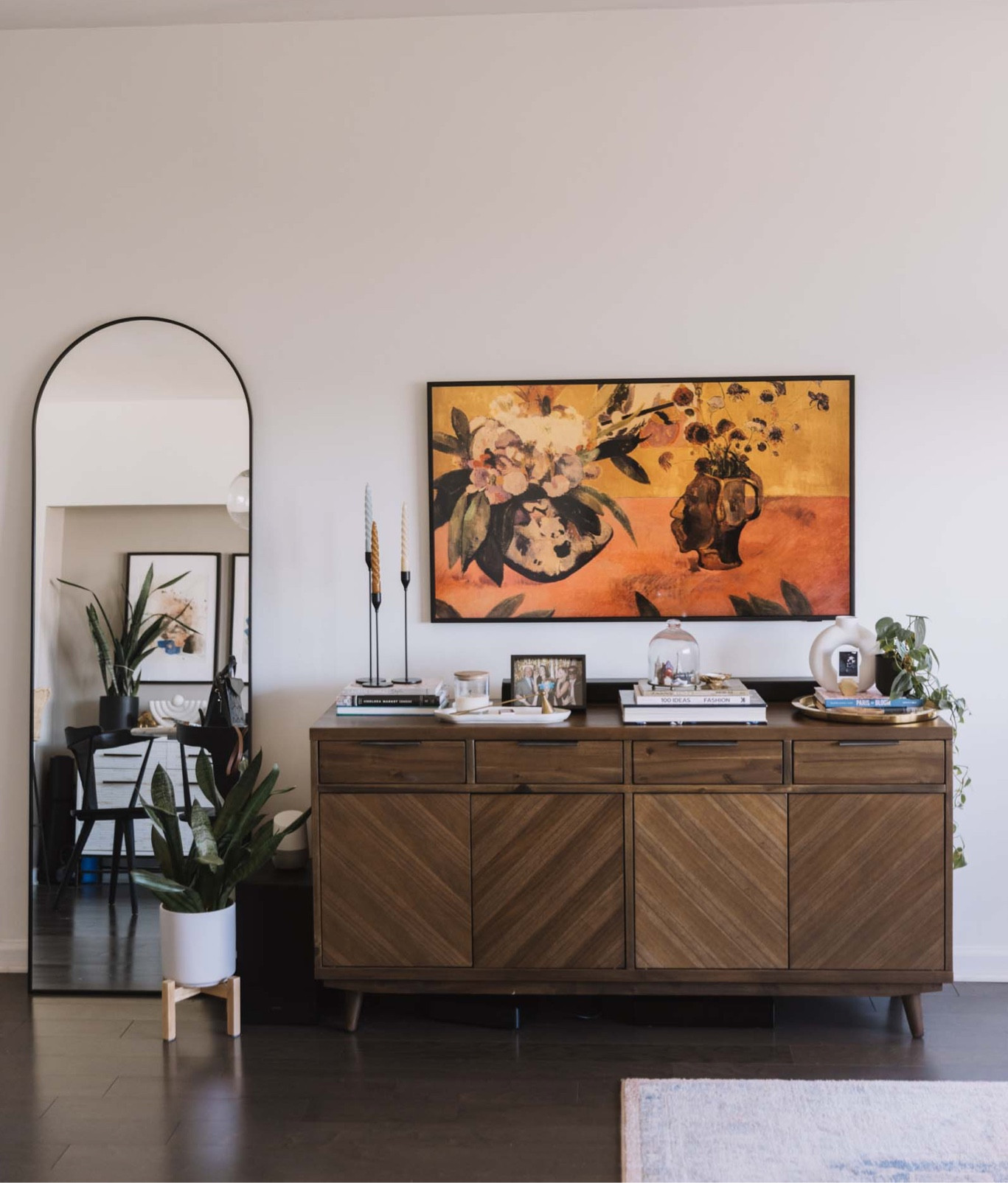 Wooden credenza media stand buffet. Arch mirror. Frame tv. Living room ideas 

#LTKSeasonal #LTKhome #LTKstyletip