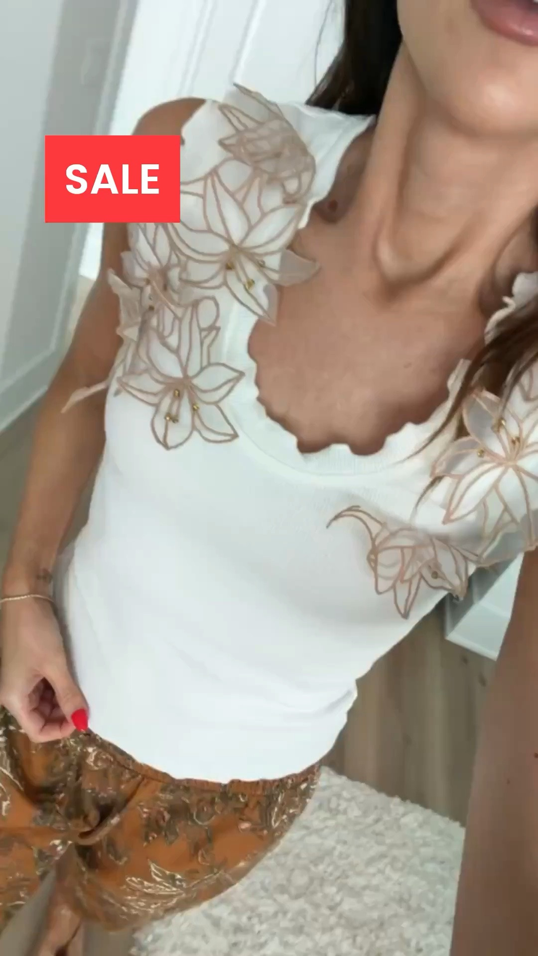 Beautiful floral tank from Anthropologie on sale for $69.

A romantic summer outfit that pairs a floral appliqué tank with breezy printed pants for an effortlessly chic vacation look.

vacation dinner outfit, European summer style, resort wear look, feminine summer outfit, coastal chic style, printed pants outfit, romantic summer look, vacation ready style, elevated casual outfit, warm weather fashion

#LTKSaleAlert #LTKOver40 #LTKootd