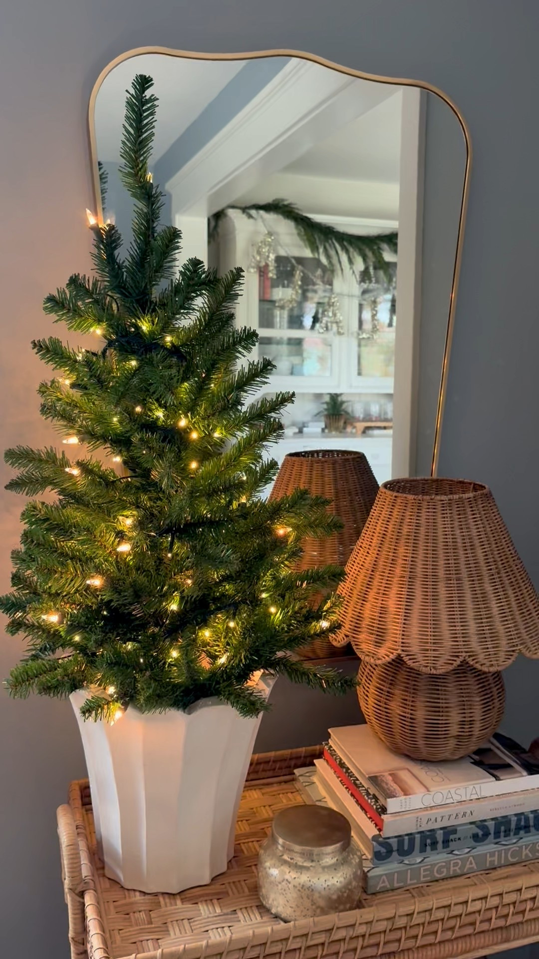 Holiday bar cart corner. Simple and I couldn’t love it more. 

#ltkhome
Holiday bar cart
Christmas Tree in a planter
Christmas Tree in a basket 
Scallop mirror 

#LTKFindsUnder100 #LTKHoliday #LTKSeasonal