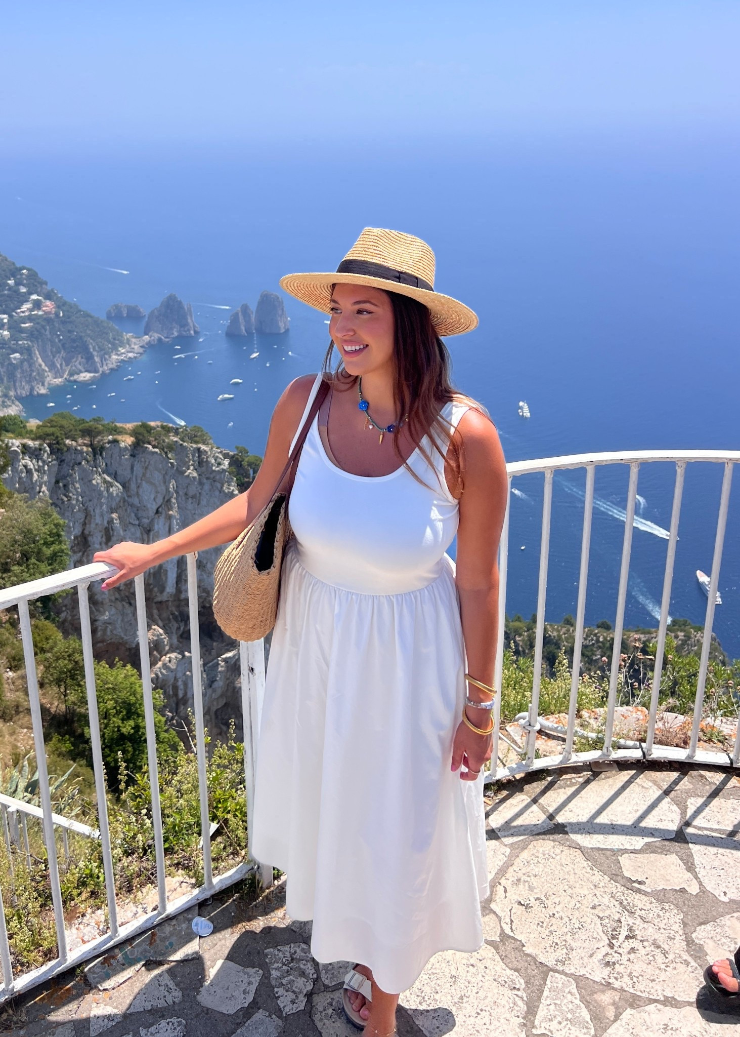 This white midi dress is the definition of effortless Italian summer style. Lightweight, flattering, and easy to wear all day while exploring the Amalfi Coast. Paired it with a straw hat, woven tote, and simple sandals for a timeless vacation look that works for sightseeing, lunch with a view, or sunset strolls.

Keywords: white midi dress, white summer dress, Amalfi Coast outfit, Italy vacation outfit, European summer style, Positano outfit, Capri outfit, travel dress, lightweight summer dress, flattering midi dress, straw hat outfit, woven straw bag, summer sightseeing outfit, vacation outfit inspiration, resort wear, neutral summer outfit, classic summer style, breathable summer dress, travel friendly outfit

#LTKfoodie #LTKValentine #LTKdayinmylife
