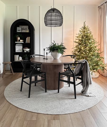 simple holiday table that will last you all winter long… a large vase with winter foliage and a pair of candlestick holders 👌🏽❄️

I’m LOVING these bulk Norfolk pine branches from amazon! you can add them to anything and it instantly looks festive! 😍

#LTKhome #LTKSeasonal #LTKHoliday