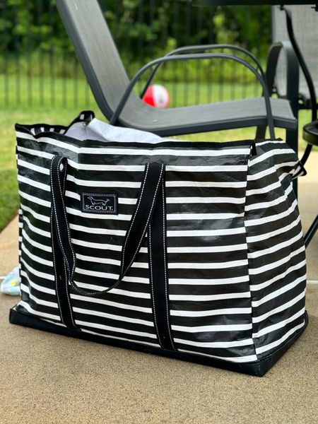 My favorite utility tote! I use for travel, the beach, lake and pool. Waterproof, holds up to 75lbs, folds flat, super durable, & holds everything! 