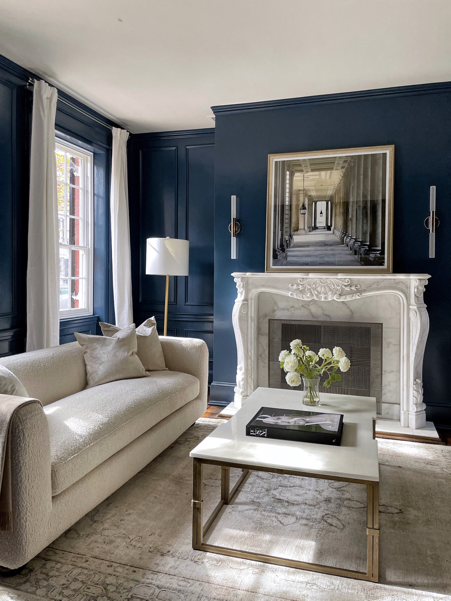 Unleash the Enigmatic Elegance: Step into a realm of captivating beauty with this mesmerizing living room. The moody blue walls create an enchanting backdrop, while the intricate details of the fireplace evoke a sense of grandeur. Adorned with luxury home decor, the white furniture exudes a timeless charm that complements the space flawlessly. Get ready to immerse yourself in the captivating allure of this exquisite sanctuary. ✨🔥 #EnigmaticElegance #LuxuryLiving #TimelessCharm

#LTKFind #LTKhome #LTKfamily