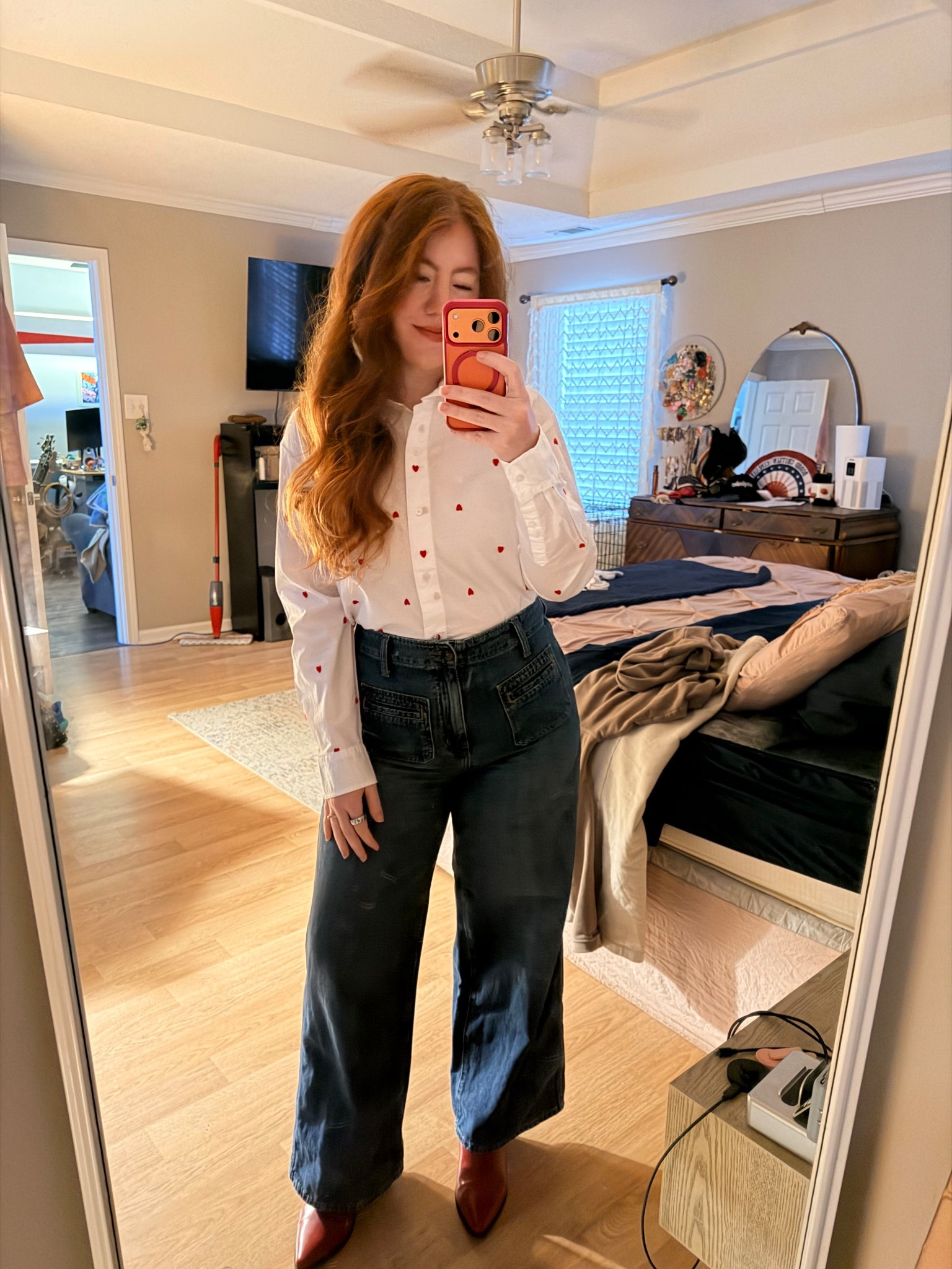 Valentines pretty much starts now. Why not kick it off with this cute cropped button down with tiny hearts in it! I paired it with wide leg jeans and my trusty red cowgirl boots  

#LTKootd #LTKMidsize #LTKWorkwear