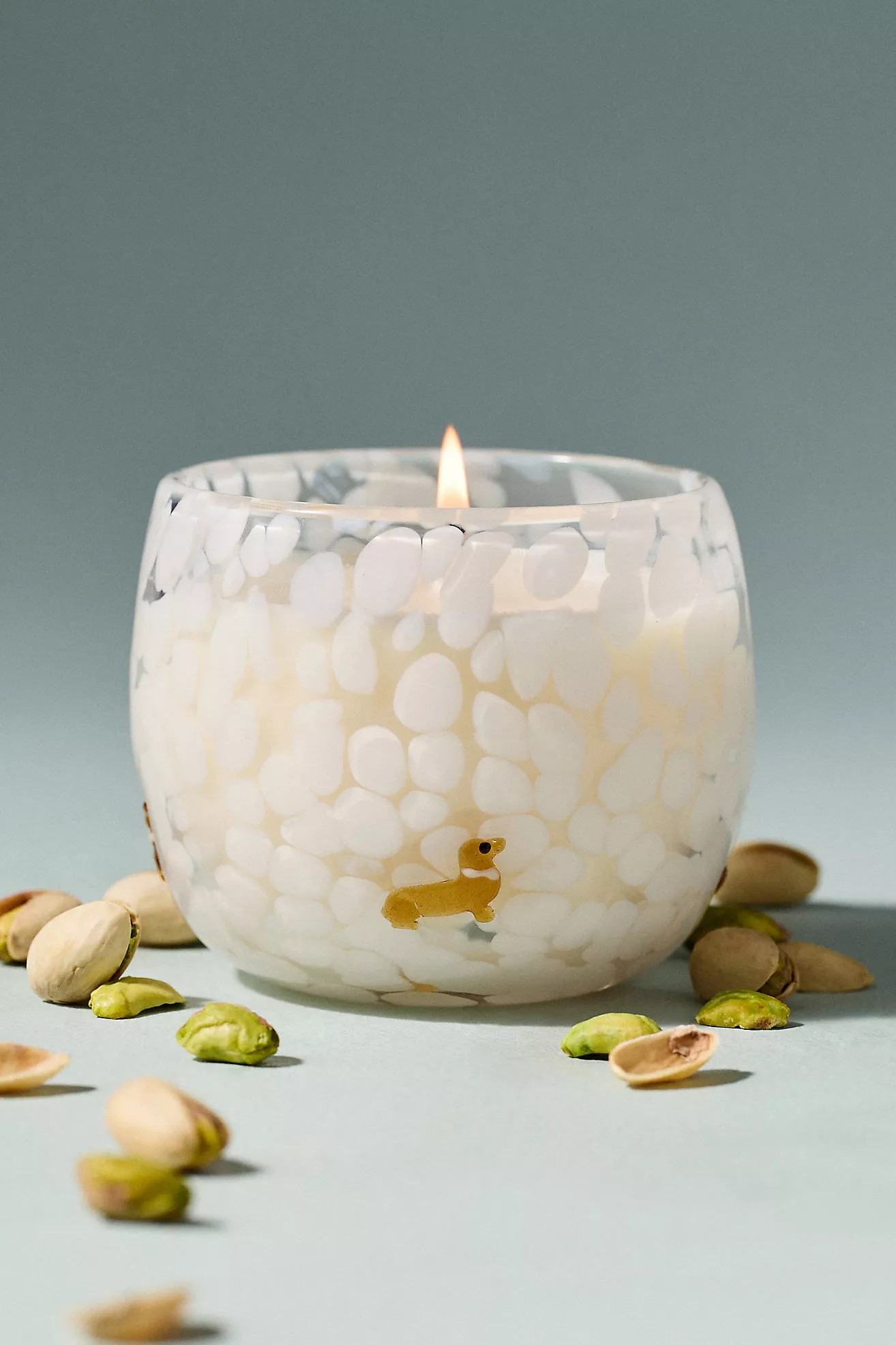Confetti Icon Dachshund Gourmand Pistachio Glass Candle | Anthropologie (US)