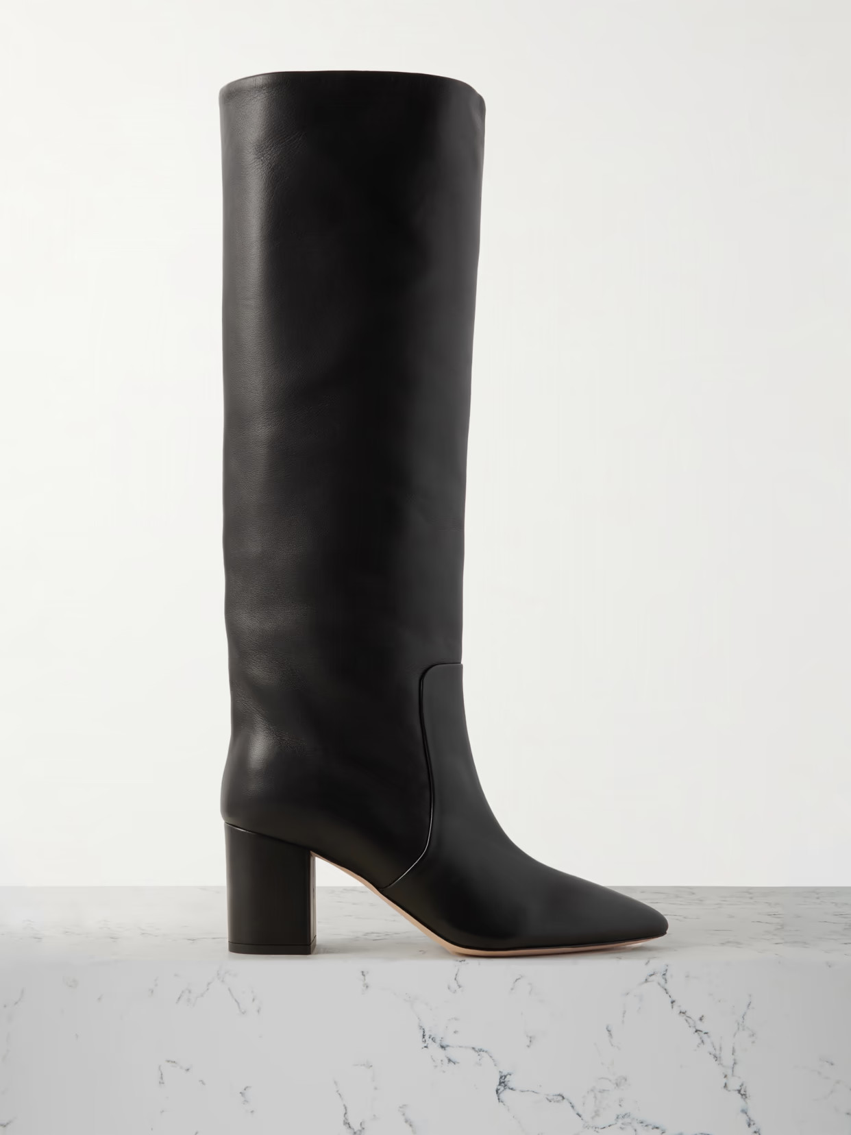 PORTER has declared Paris Texas' 'Anja' knee boots as one of Fall's most in-demand styles. Crafte... | NET-A-PORTER (US)