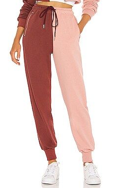 SUPERDOWN Renna Two Tone Sweatpants in Pink & Red from Revolve.com | Revolve Clothing (Global)