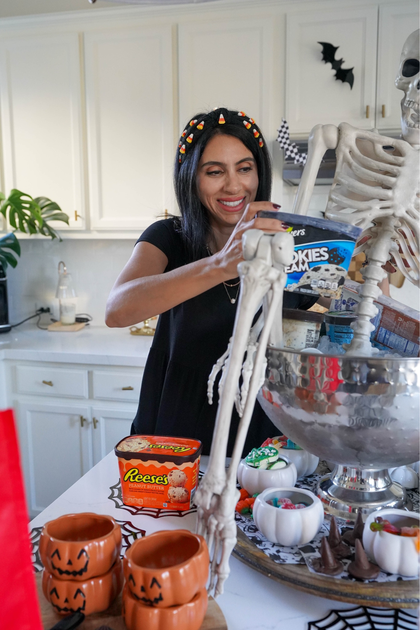[#ad] This is your sign to set up a scary sundae bar! I used a giant beverage bucket, carousel tray and decorative skeleton to set the mood. Then I headed to @Target with my shopping list for our favorite ice cream flavors and a variety of toppings. Which creation is your favorite?  I will type out my shopping list below! You can also shop the ice cream flavors here [LTK BUNDLE]
@breyers @Benandjerrys @talenti @klondikebar #Halloween #Scary #IceCreamSundae #Target #TargetPartner                                                   	                 
 
Shopping List:
BEN & JERRYS- Fudge Brownie
BREYERS- Cookies ‘n Cream
KLONDIKE Heath Bar
TALENTI Caramel Cookie Crunch
REESES Peanut Butter Cup
 
For the Toppings:
Gummy worms
Strawberry syrup
Crushed chocolate cookies (for “dirt”)
Gummy brains
Gummy eye balls
Melted monster marshmallow topper
Eyeball sprinkles
Gummy fingers
Gummy insects
Chocolate witches hats (we made these!)


#LTKFamily #LTKHalloween #LTKKids