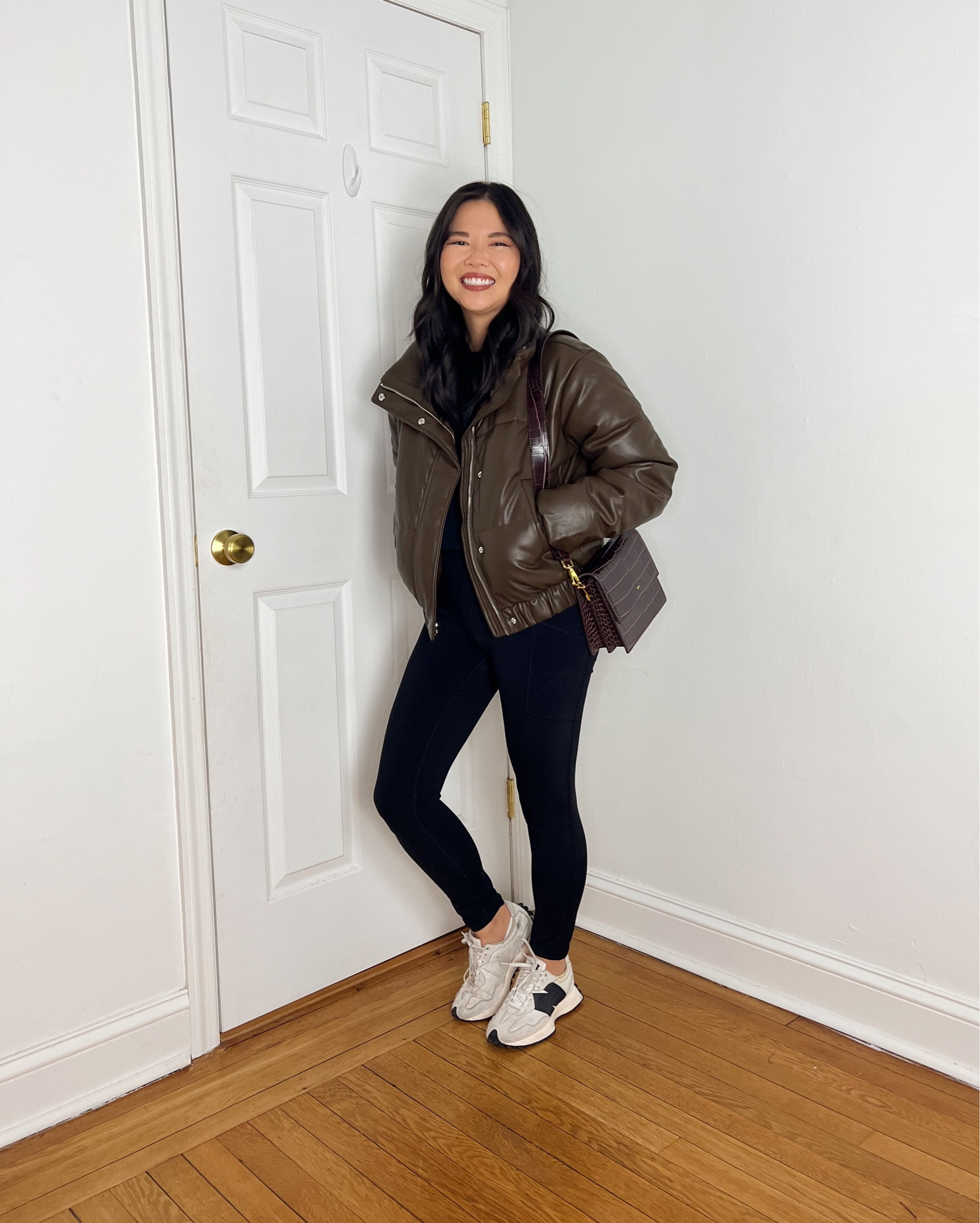 Dark brown puffer jacket (XS)
Faux leather puffer jacket 
Cropped puffer jacket 
Black sweatshirt  (S)
Black cropped sweatshirt 
High waisted leggings (XS)
Black workout leggings 
New balance 327 sneakers  (TTS)
Athleisure outfit 
Workout outfit 
Mom outfit 
Abercrombie outfit

#LTKfitness #LTKSeasonal #LTKstyletip