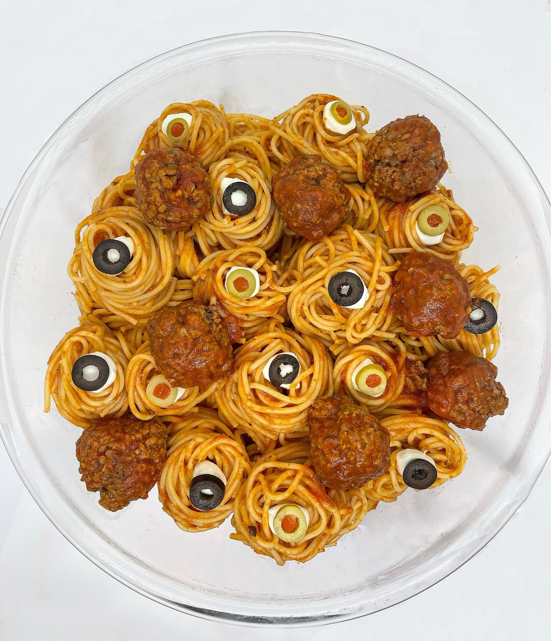 L👁️👁️KING for a fun Halloween dish? Try this EYEBALL SPAGHETTI! It’s spooky themed and will have your guests giving it a double take. 👀 🍝 

TO MAKE: Cook spaghetti then toss in a red sauce. Fill a bowl half way with the spaghetti and top it with lots of swirled spaghetti nests. Add a @belgioiosocheese mozzarella pearl to each nest and top with a sliced black or green olive. Then place cooked meatballs in between the spaghetti nests. 

#halloween #halloweenfood #pasta 

#LTKHalloween #LTKHoliday #LTKParties