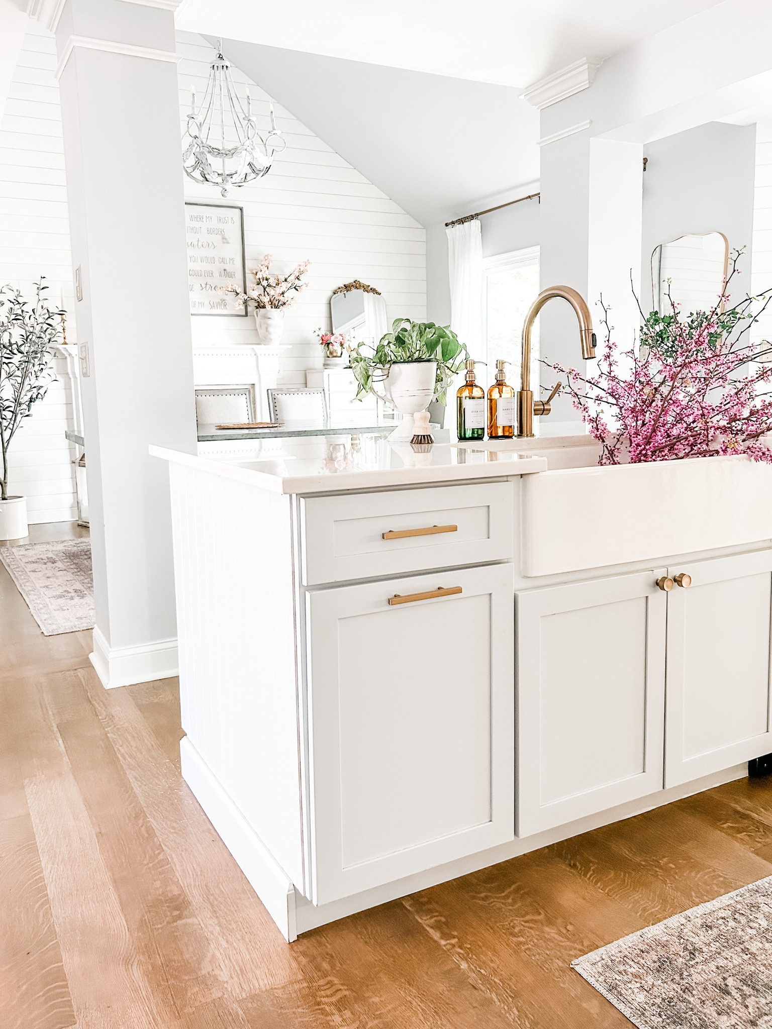 Current kitchen view!

Kitchen decor, amber glass bottle soap dispenser, pot scrubber, bamboo palm scrubber, champagne bronze handles, bronze knobs, kitchen hardware, kitchen Knob, kitchen drawer pulls, cabinet hardware, kitchen rug, kitchen runner, Loloi rug, champagne bronze faucet, farmhouse sink, Amazon curtains, Amazon drapes, artificial olive tree, kitchen island, Studio McGee mirror, curved mirror, arched mirror.
#kitchen 

#LTKhome #LTKFind #LTKstyletip