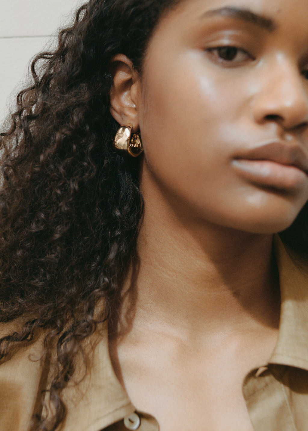 Twisted hoop earrings | Mango (US/MX/AU)