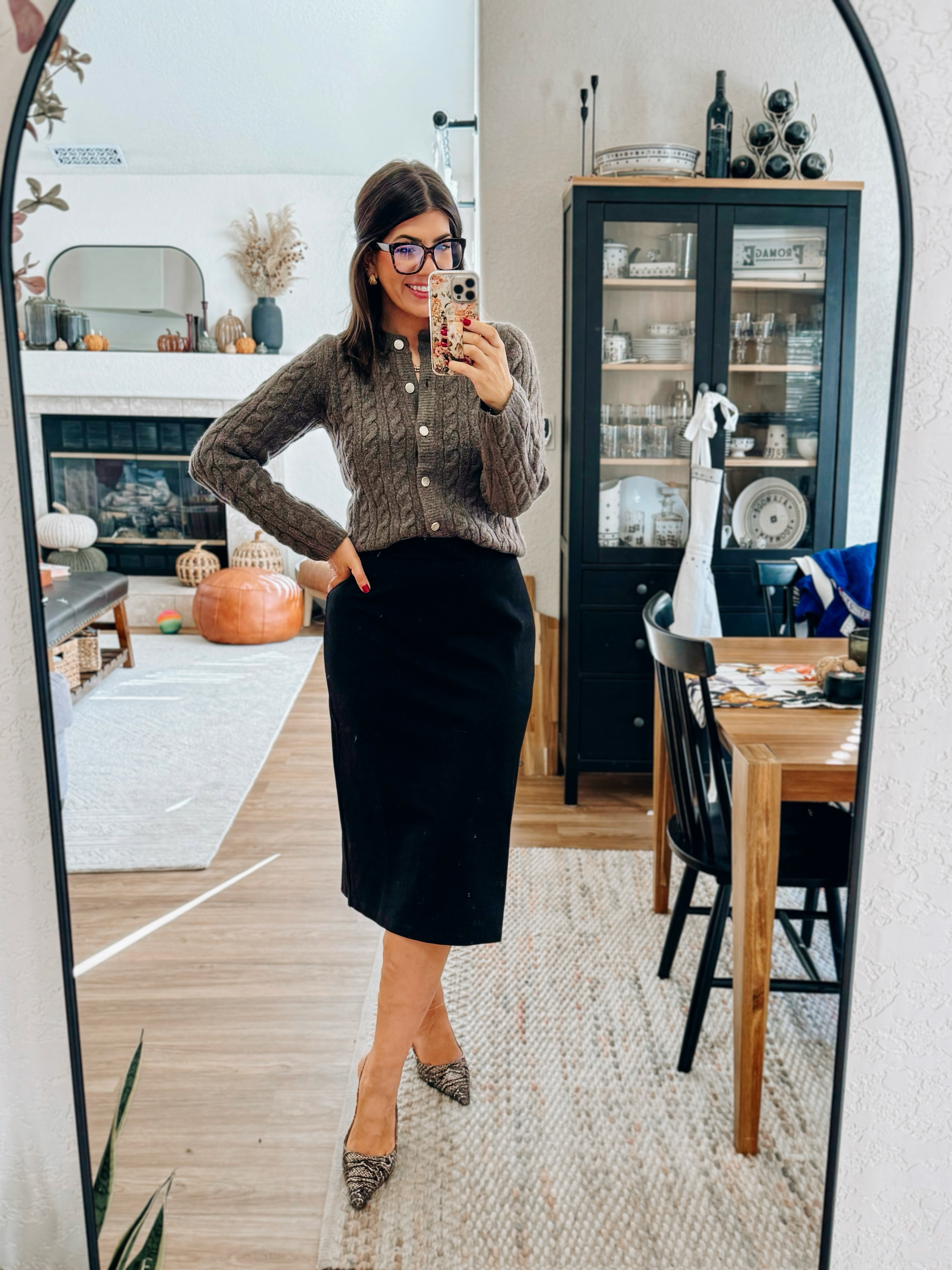 In a medium cardigan and large pencil skirt 

#LTKMidsize #LTKWorkwear #LTKFindsUnder50
