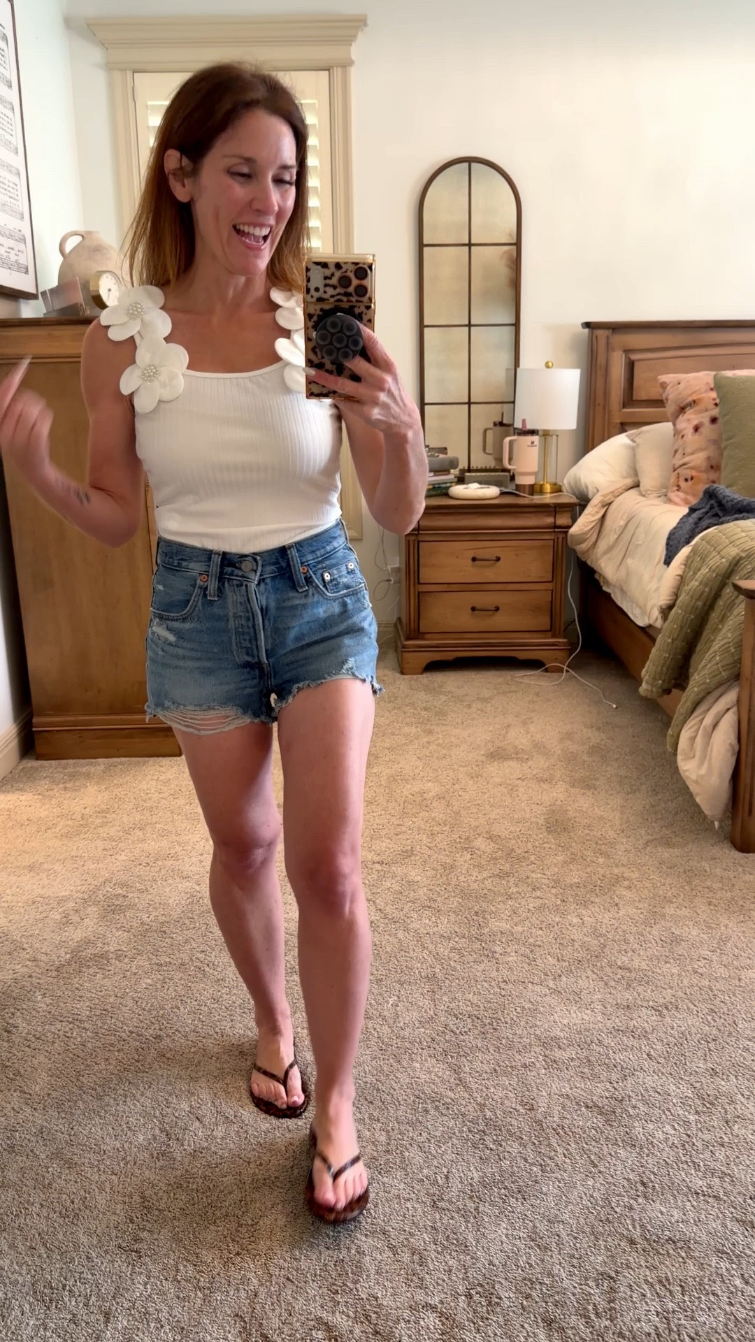 Sometimes it’s the little details that make an outfit. 🤍🌸

I fell in love with the floral shoulder detail on this tank! Paired with classic denim shorts, it’s the perfect outfit for everything from running errands to brunch, vacation, or a casual summer night out.

Simple, comfortable, and easy to style… exactly the kind of pieces I love having in my closet.

I’ve linked everything in my LTK if you’d like to shop the look! ✨

Now I need your opinion…
Would you wear this top with:
💙 Denim shorts
🤍 White jeans
👖 Wide-leg denim
🌸 A flowy skirt

Tell me your favorite below! 👇

#LTKStyle #LTKFinds #SummerStyle #DenimShorts #CasualChic #PetiteFashion #EverydayOutfit #SummerFashion #EffortlessStyle #OOTD

#LTKootd #LTKPetite #LTKOver40
